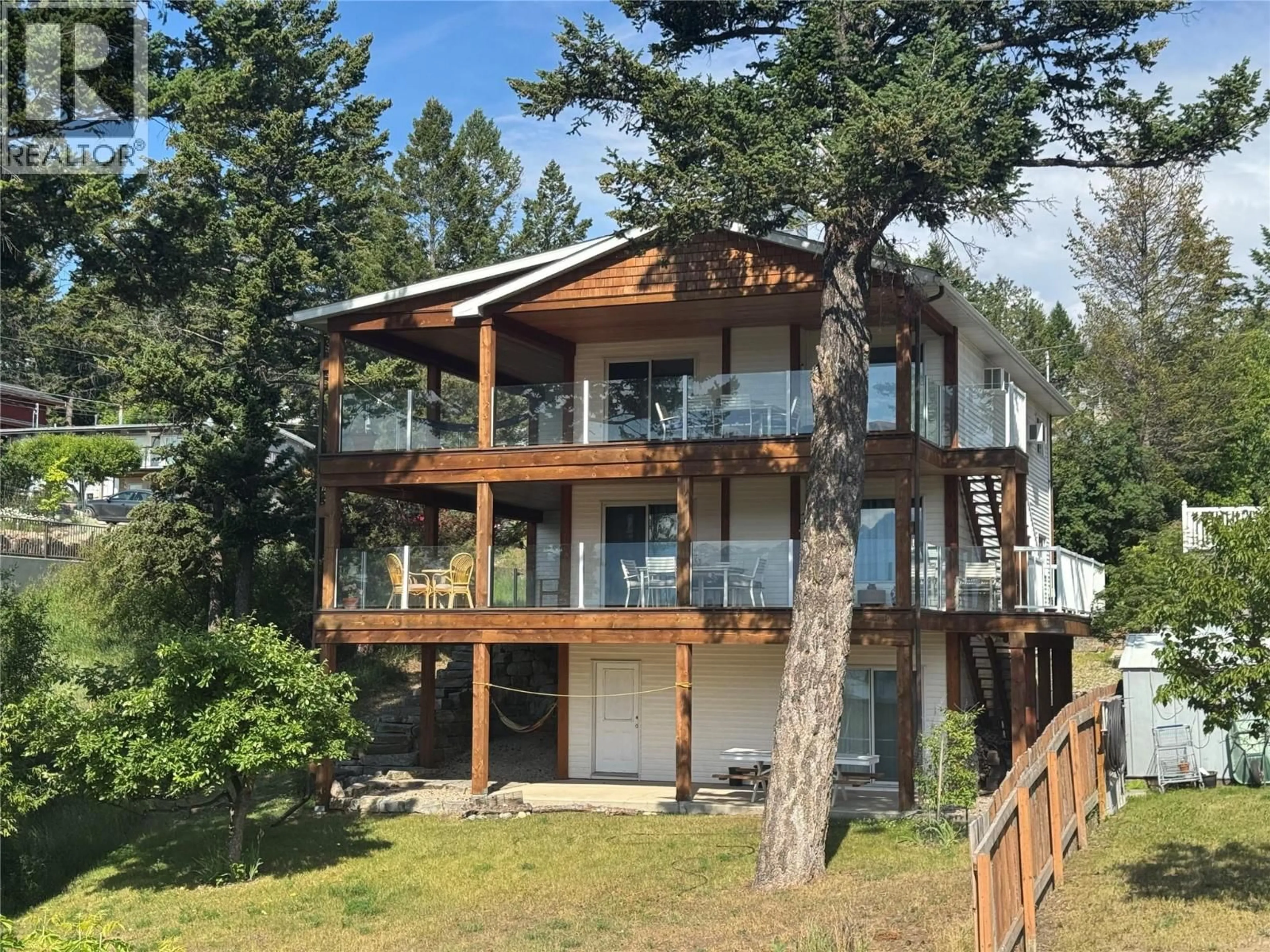 A pic from outside/outdoor area/front of a property/back of a property/a pic from drone, water/lake/river/ocean view for 1725 6TH AVE AVENUE, Invermere British Columbia V0A1K0