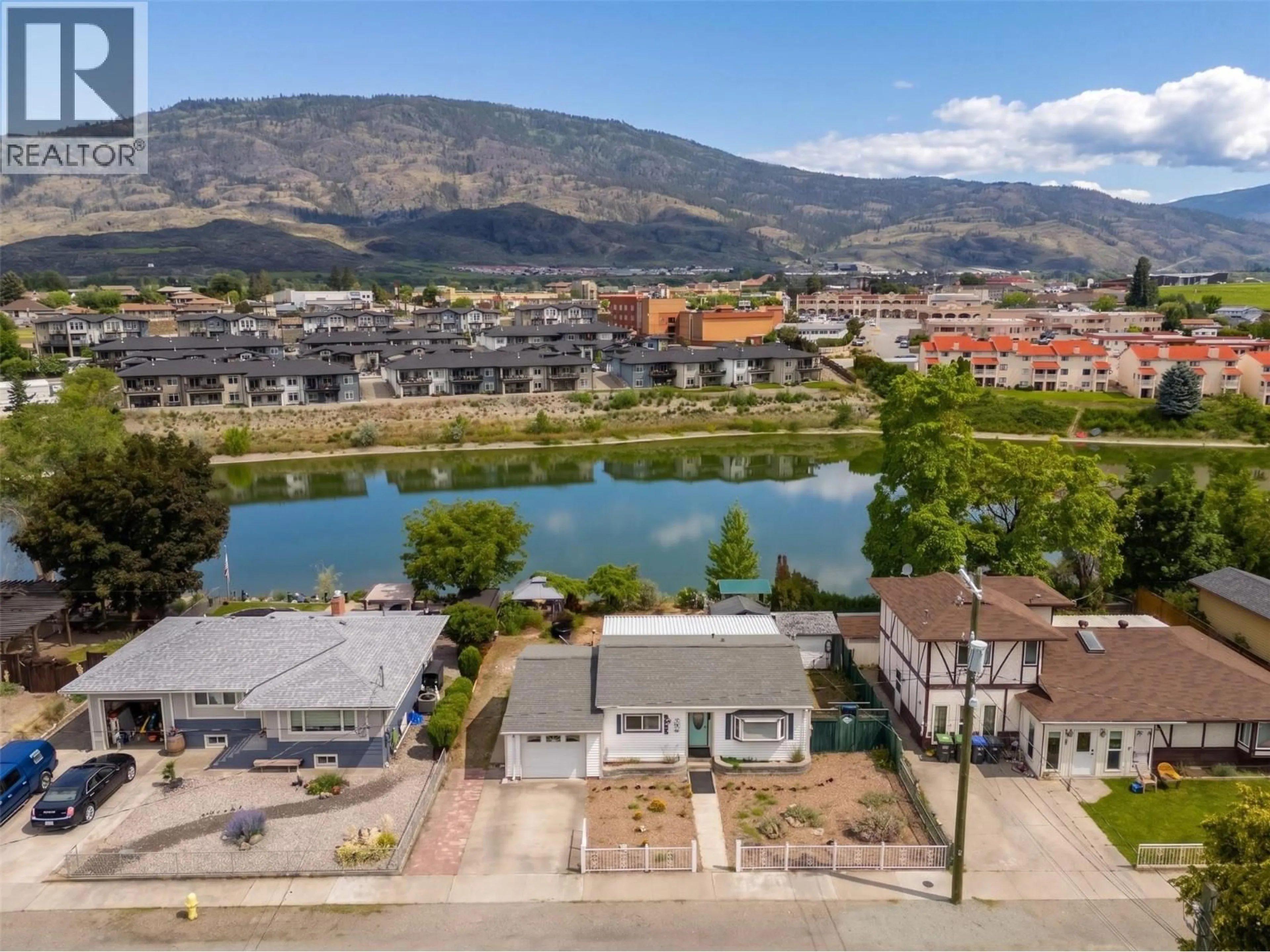 A pic from outside/outdoor area/front of a property/back of a property/a pic from drone, water/lake/river/ocean view for 7816 89TH STREET, Osoyoos British Columbia V0H1V0