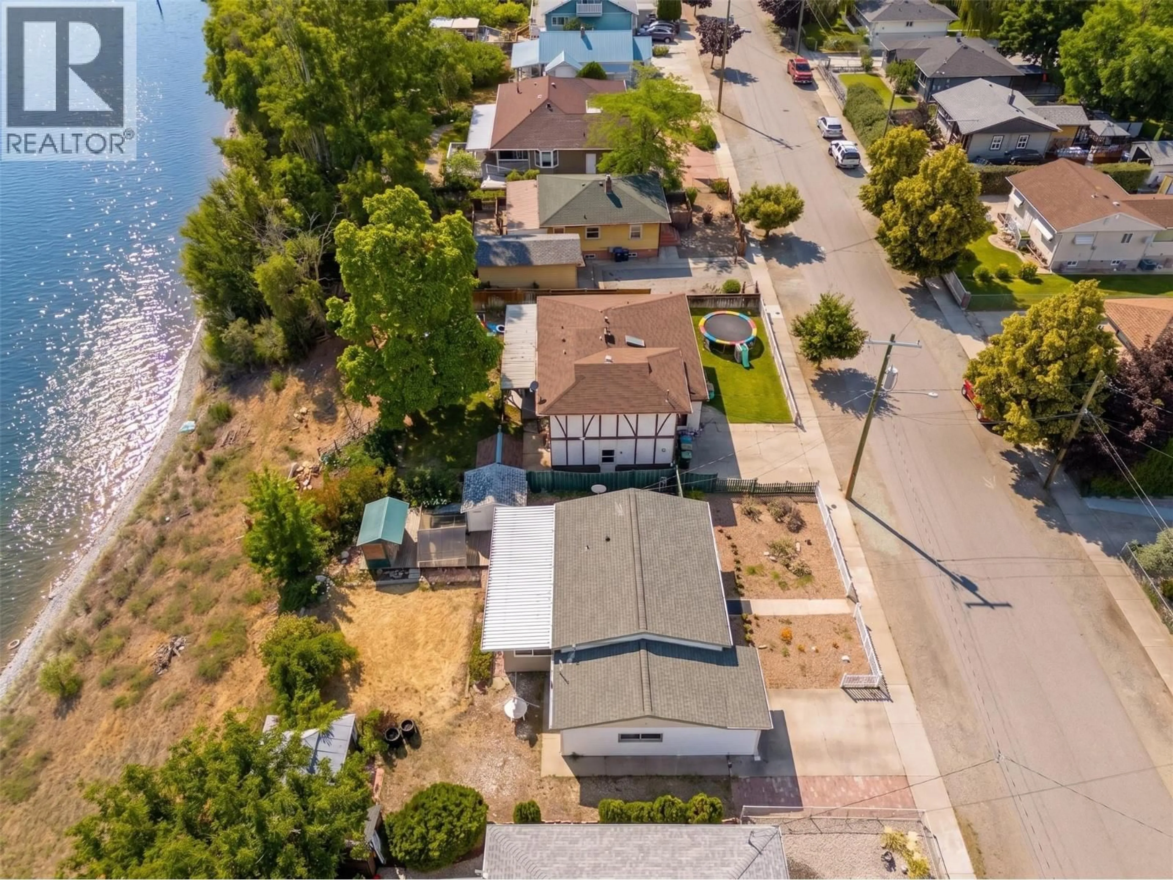 A pic from outside/outdoor area/front of a property/back of a property/a pic from drone, water/lake/river/ocean view for 7816 89TH STREET, Osoyoos British Columbia V0H1V0