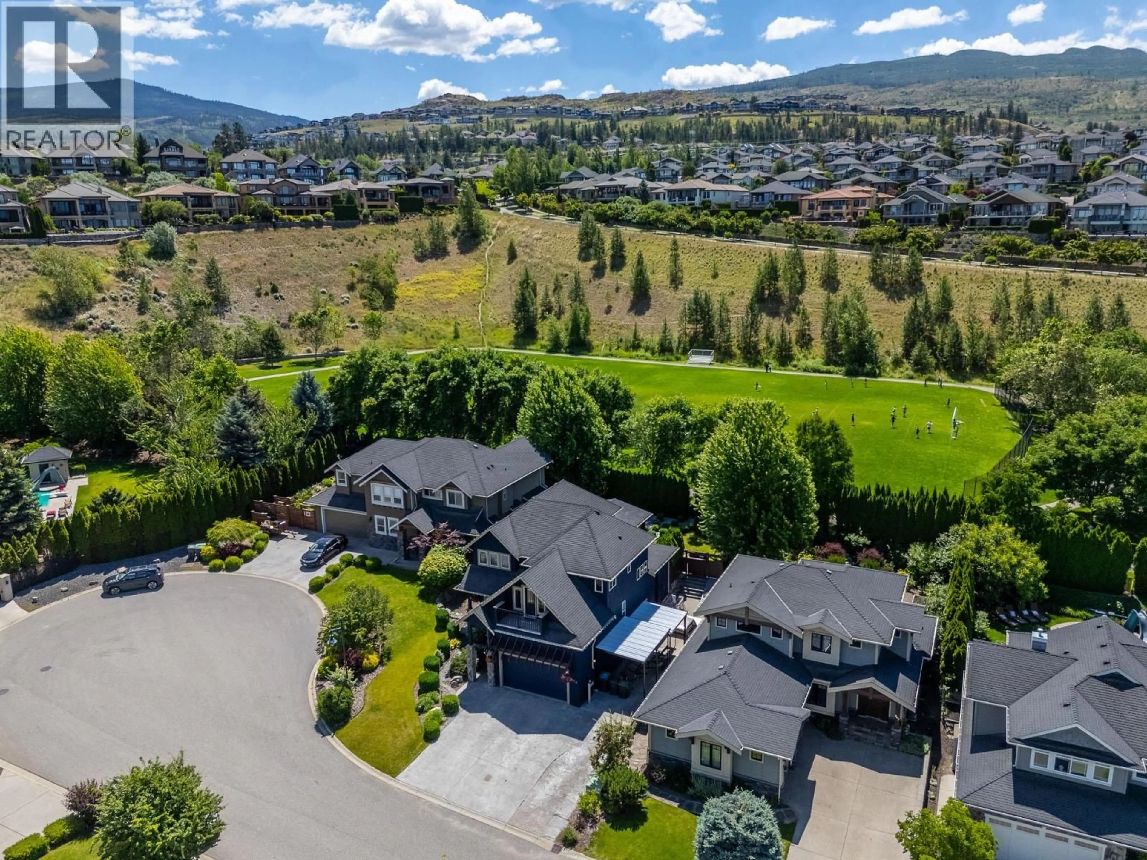 A pic from outside/outdoor area/front of a property/back of a property/a pic from drone, mountain view for 673 QUARRY AVENUE, Kelowna British Columbia V1W5E2