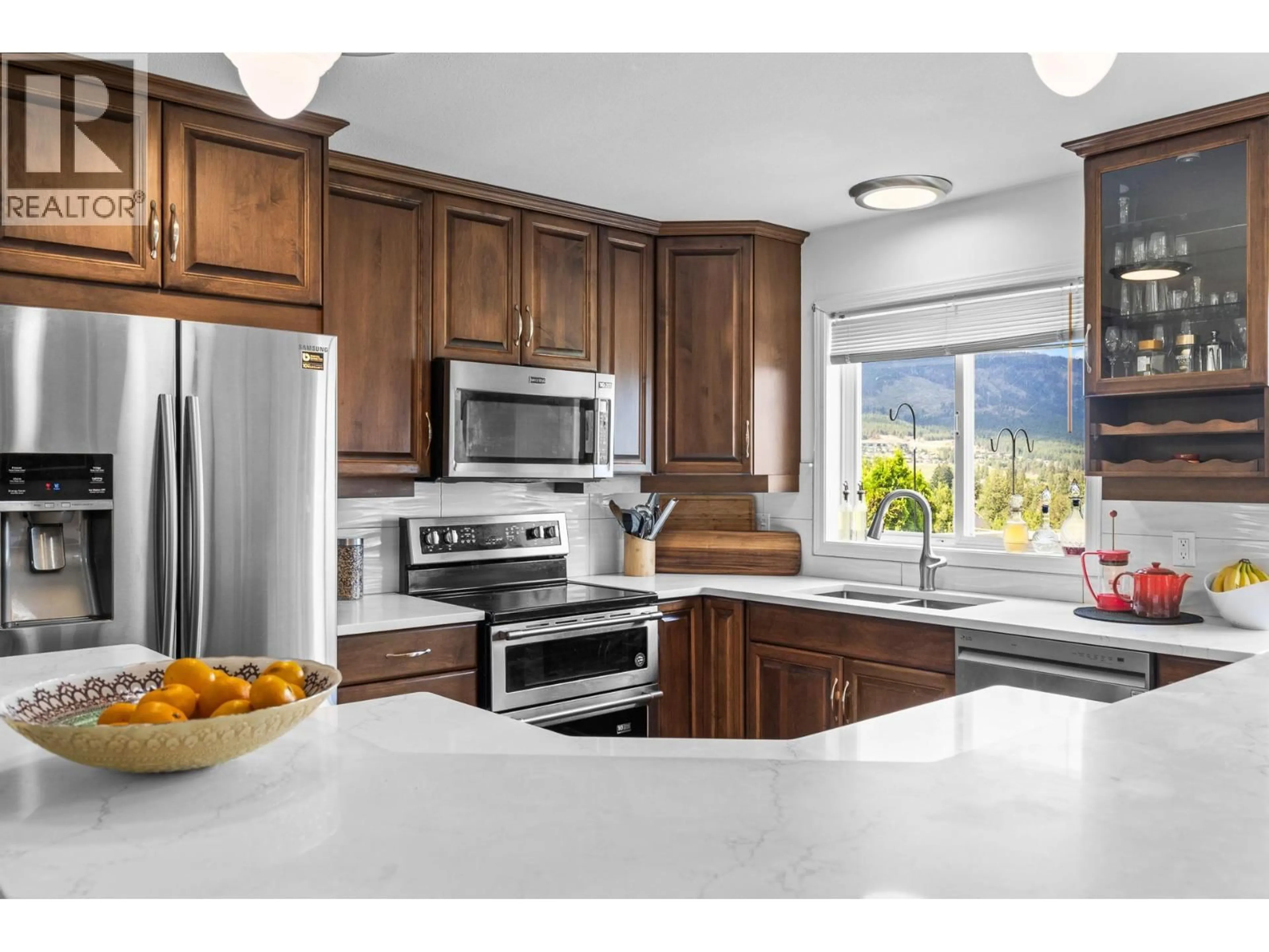 Open concept kitchen, ceramic/tile floor for 3669 YORKTON ROAD, West Kelowna British Columbia V4T3T7
