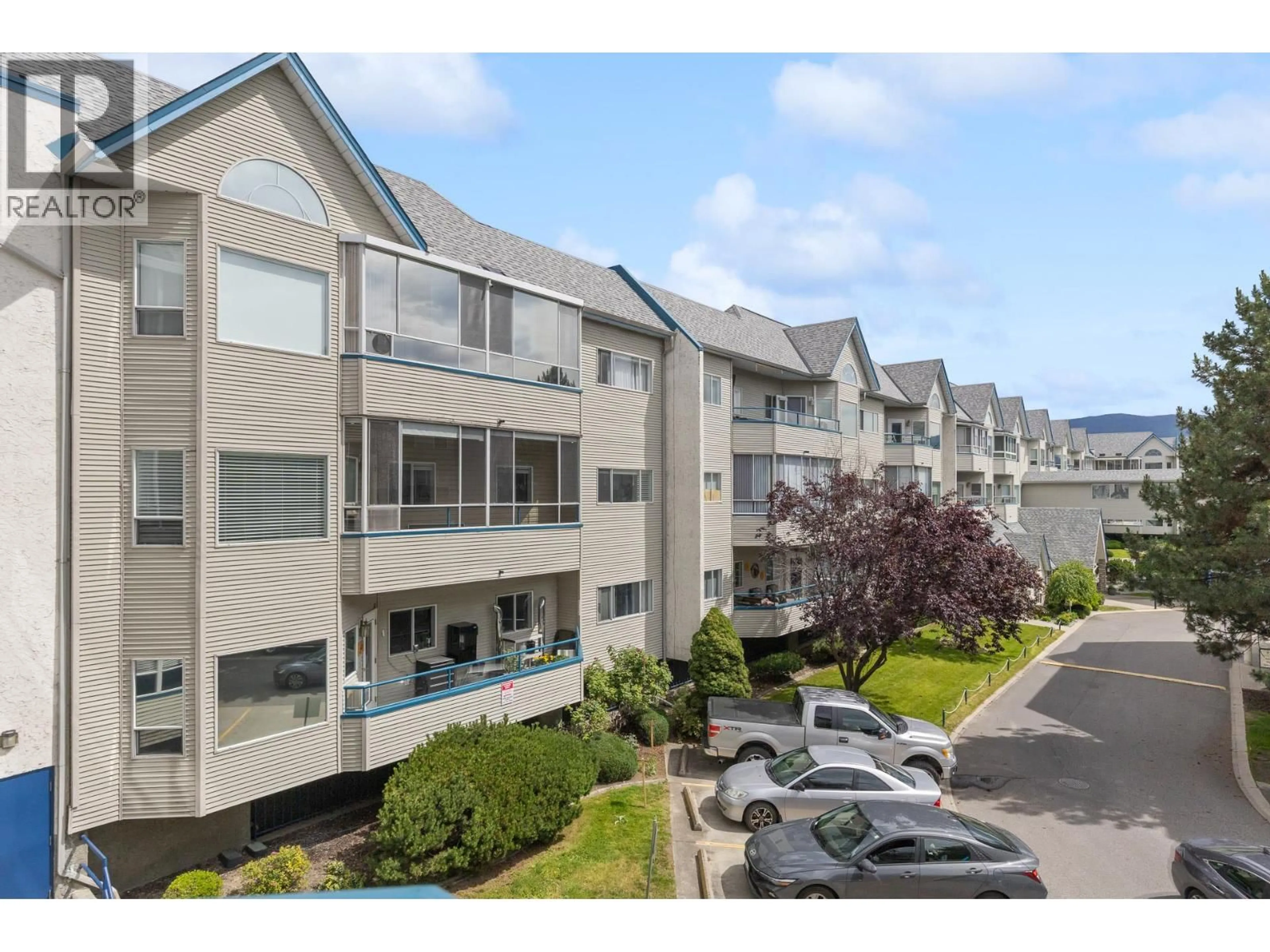 A pic from outside/outdoor area/front of a property/back of a property/a pic from drone, mountain view for 223 - 877 KLO ROAD, Kelowna British Columbia V1Y9R1