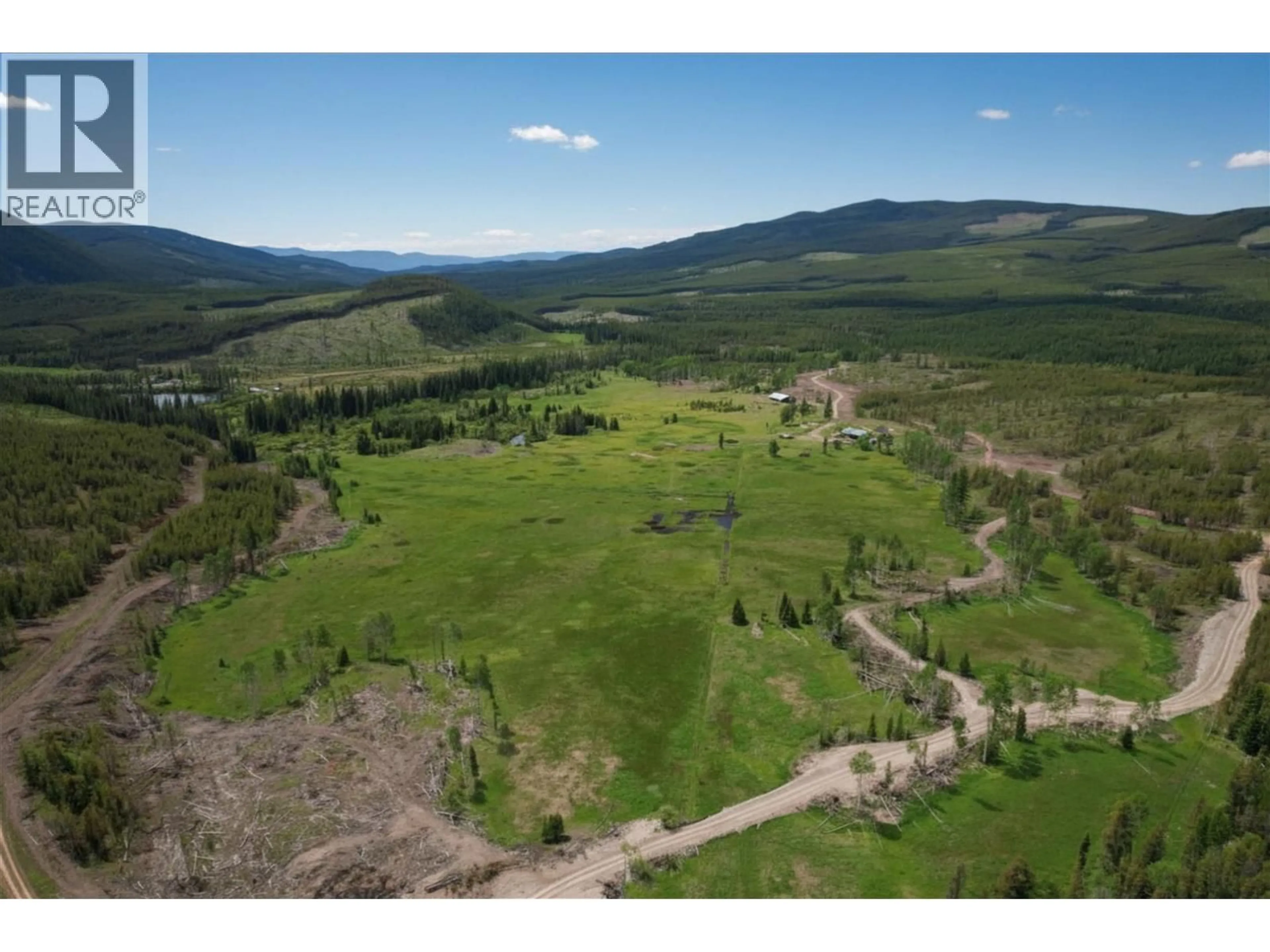A pic from outside/outdoor area/front of a property/back of a property/a pic from drone, mountain view for 6730 GOLD CREEK ROAD, Cranbrook British Columbia V1C4H6
