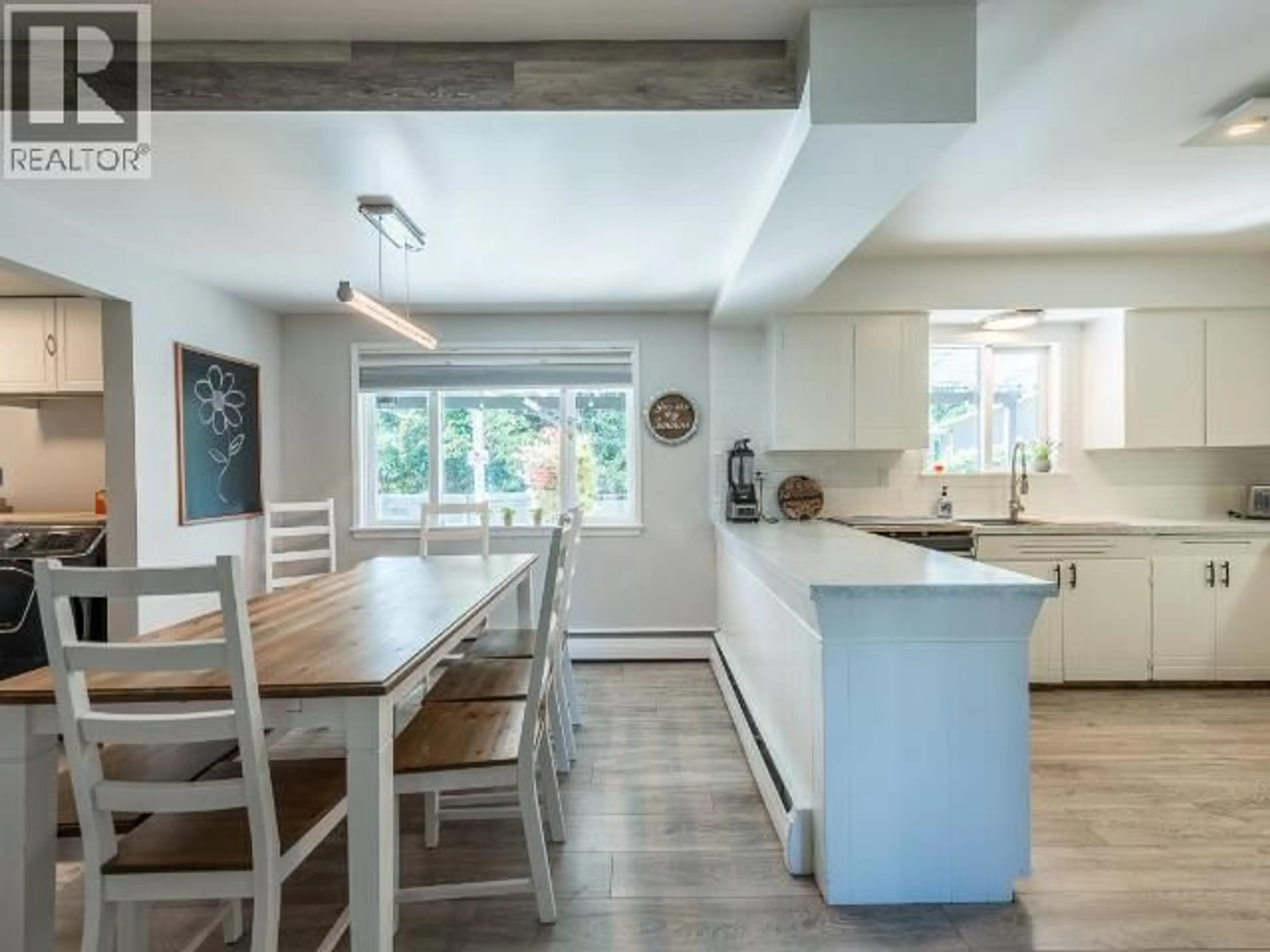 Open concept kitchen, wood/laminate floor for 2591 FLEETWOOD AVENUE, Kamloops British Columbia V2B4T1