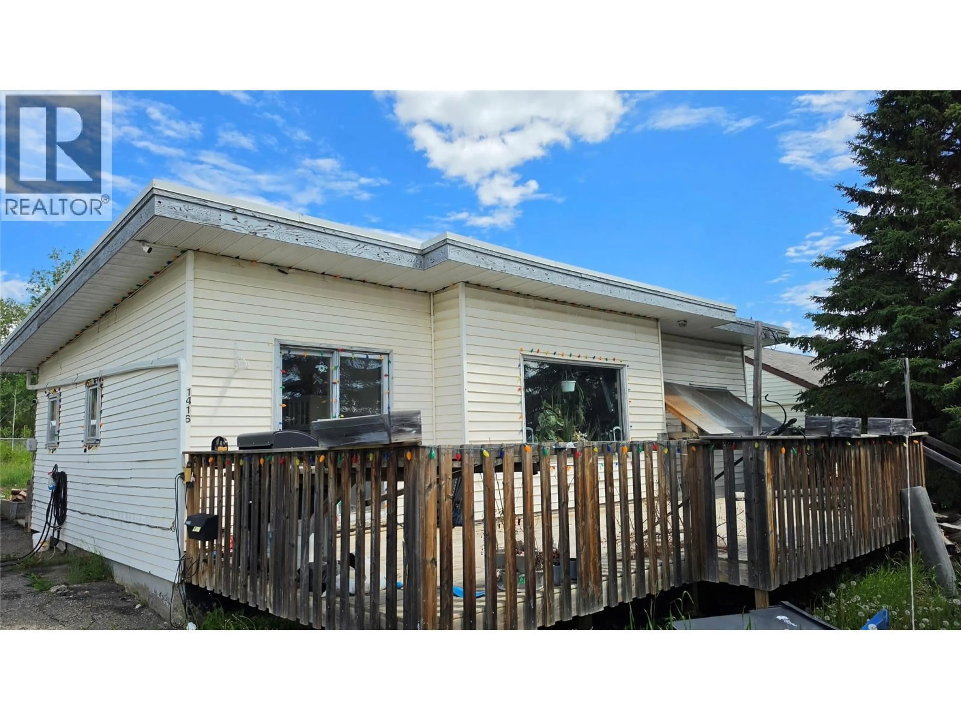 Home with vinyl exterior material, street for 1416 94 AVENUE, Dawson Creek British Columbia V1G1G8