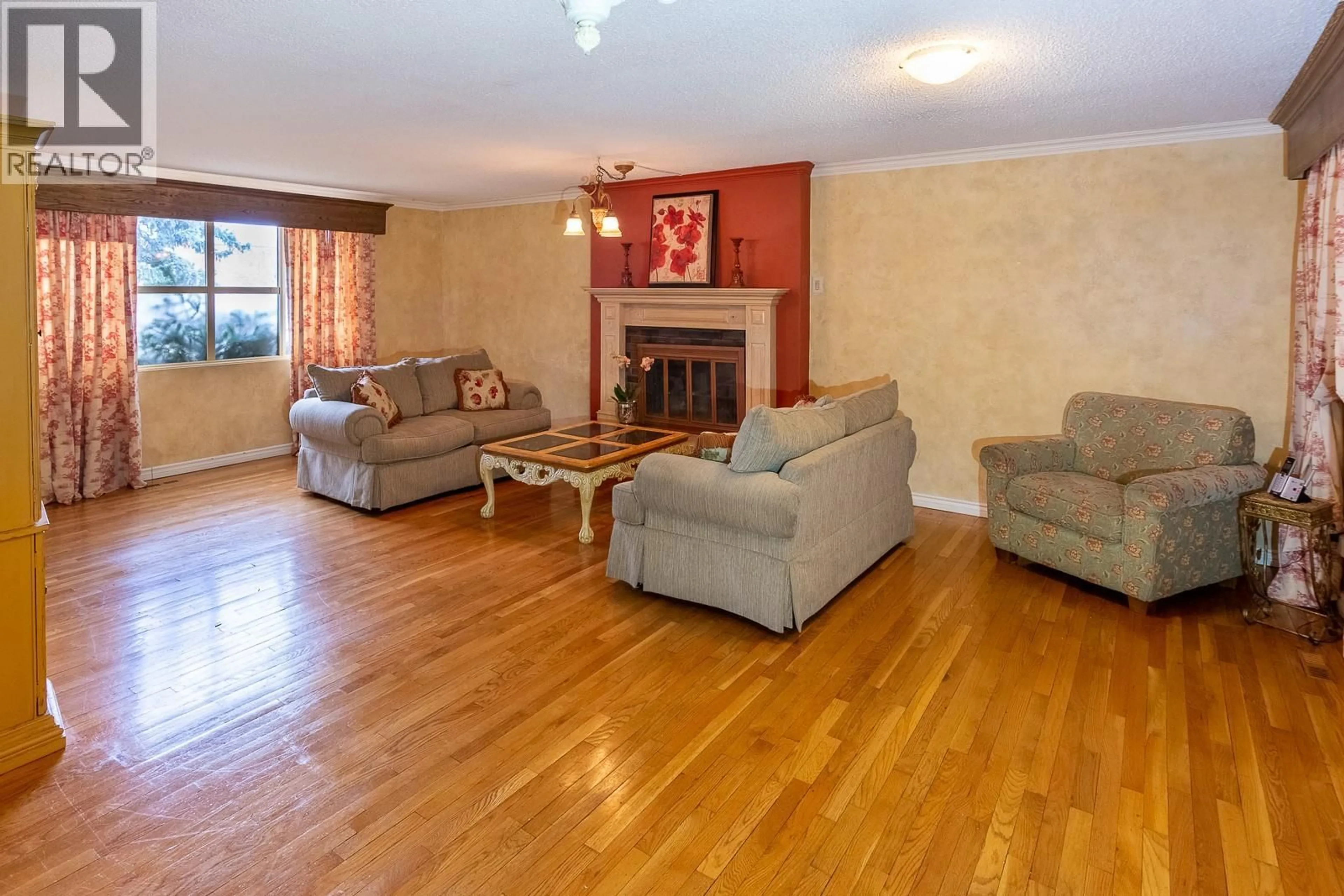 Living room with furniture, wood/laminate floor for 3606 OLD OKANAGAN HIGHWAY, West Kelowna British Columbia V4T1P4