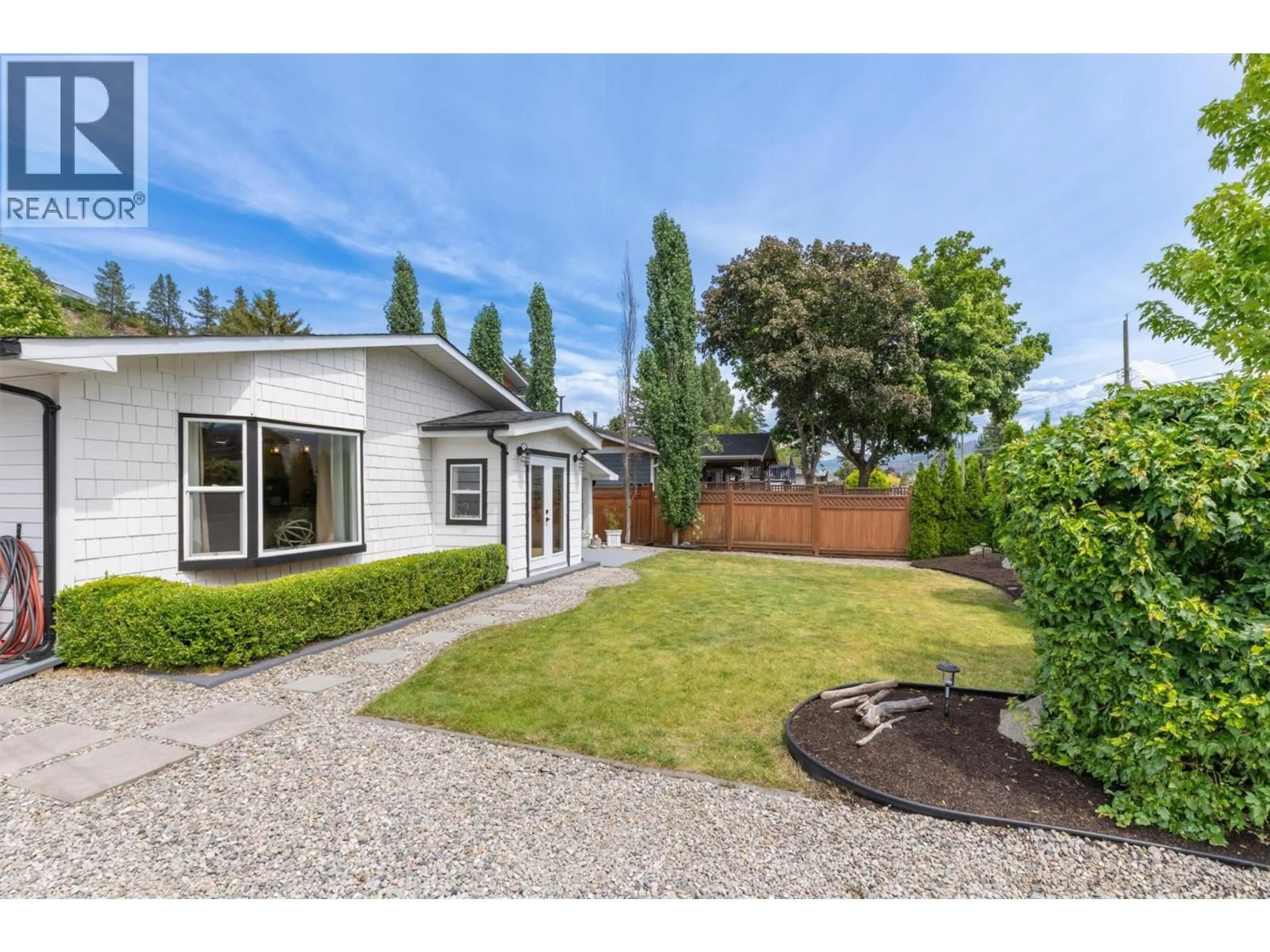 A pic from outside/outdoor area/front of a property/back of a property/a pic from drone, street for 4172 SAN CLEMENTE AVENUE, Peachland British Columbia V0H1X6