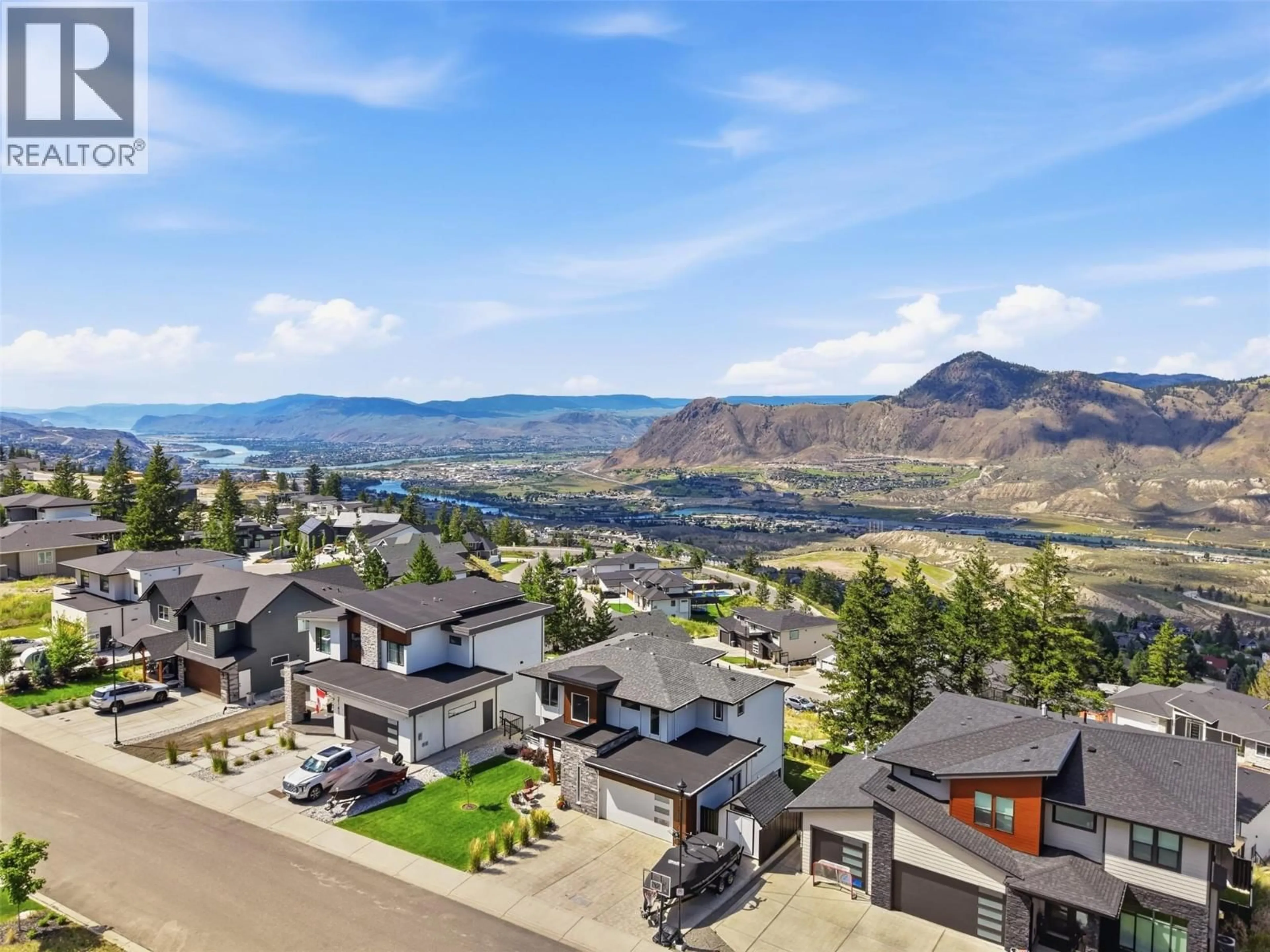 A pic from outside/outdoor area/front of a property/back of a property/a pic from drone, mountain view for 2137 LUPIN COURT, Kamloops British Columbia V2E0E2