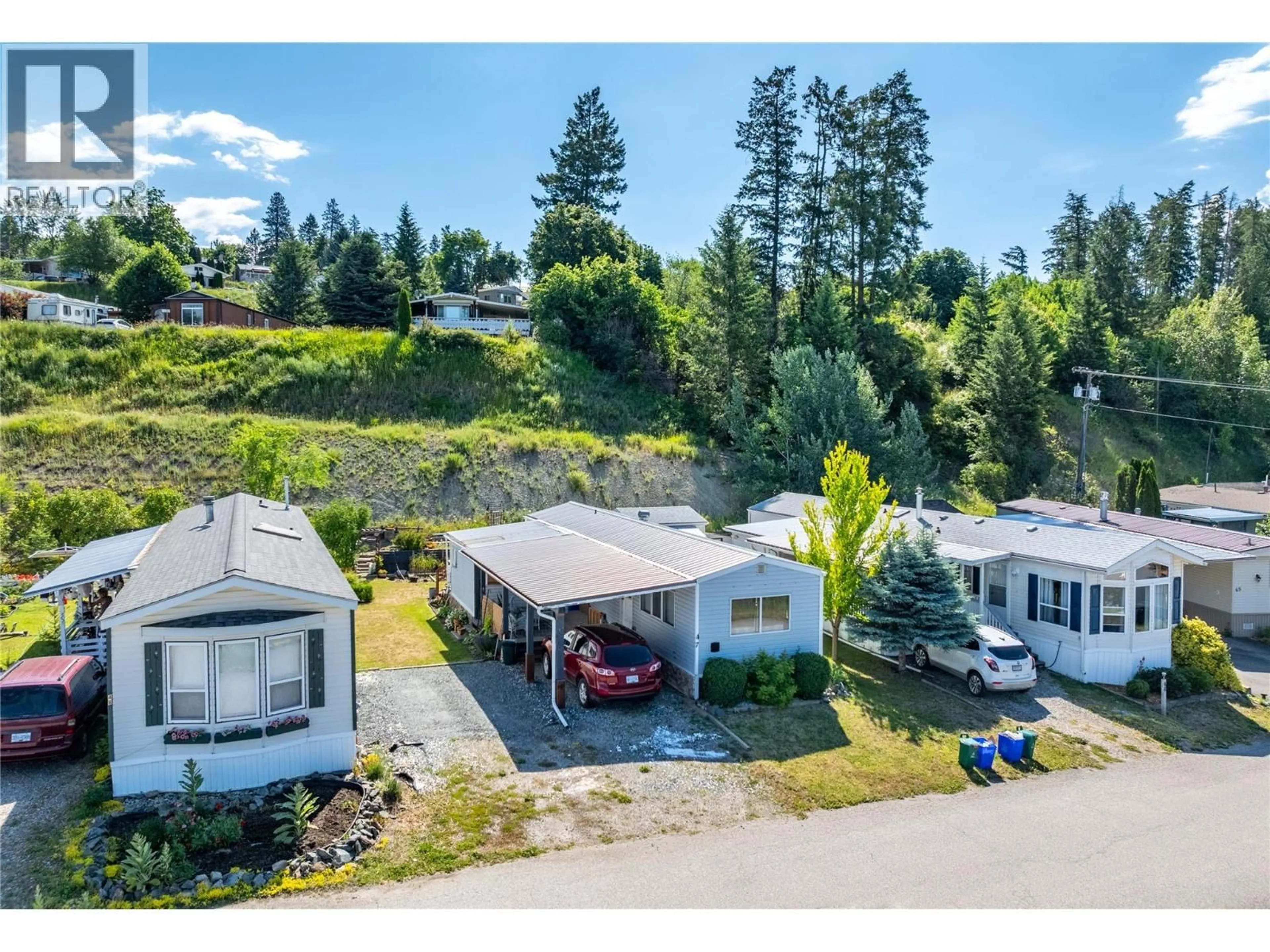 A pic from outside/outdoor area/front of a property/back of a property/a pic from drone, mountain view for 47 - 445 6TH AVENUE NORTH, Creston British Columbia V0B1G3