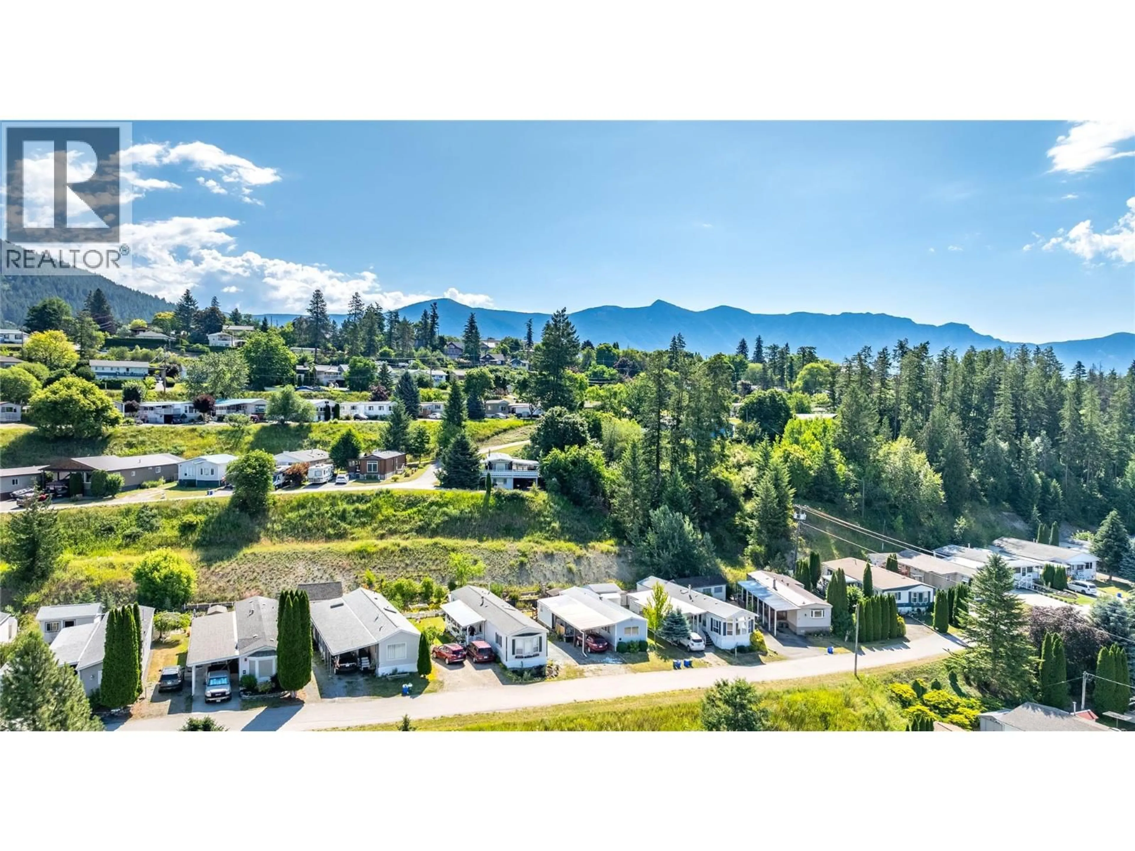 A pic from outside/outdoor area/front of a property/back of a property/a pic from drone, mountain view for 47 - 445 6TH AVENUE NORTH, Creston British Columbia V0B1G3