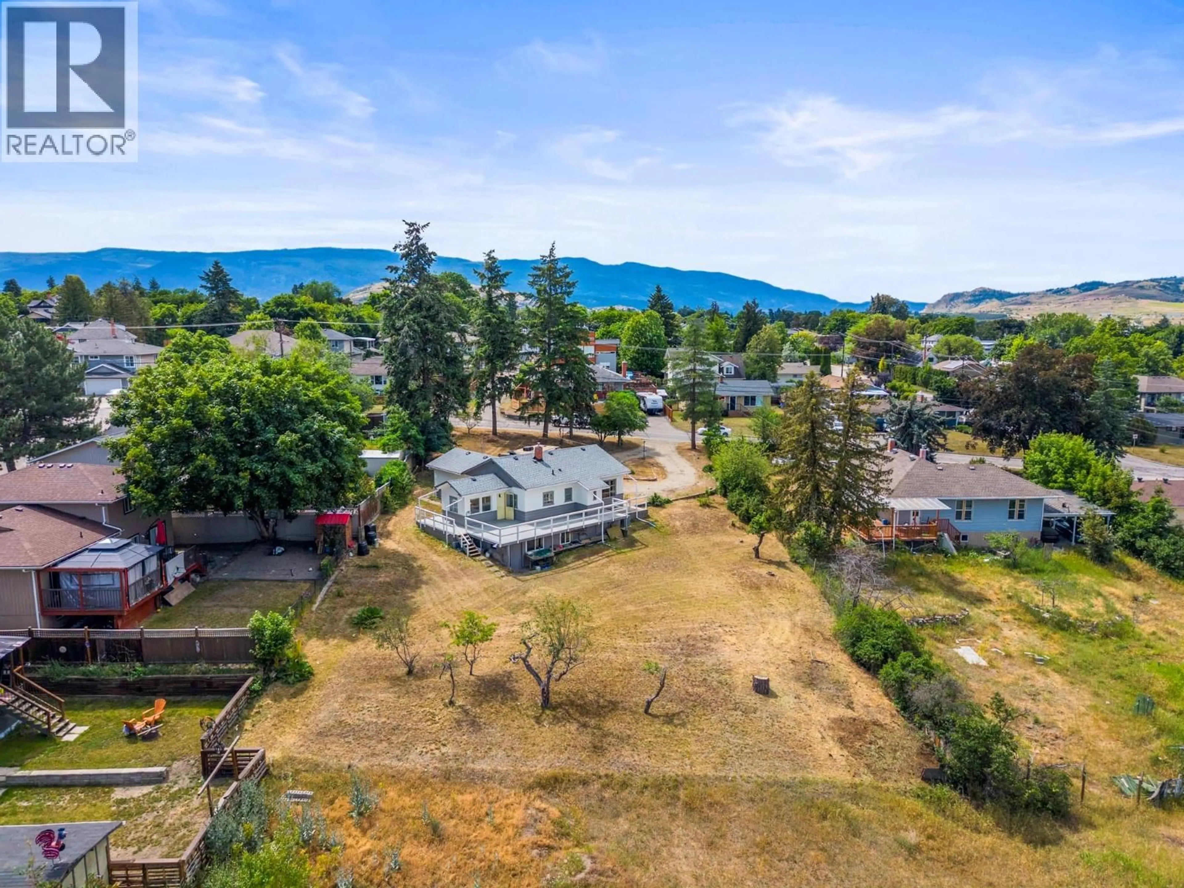 A pic from outside/outdoor area/front of a property/back of a property/a pic from drone, mountain view for 1801 39 AVENUE, Vernon British Columbia V1T3A6