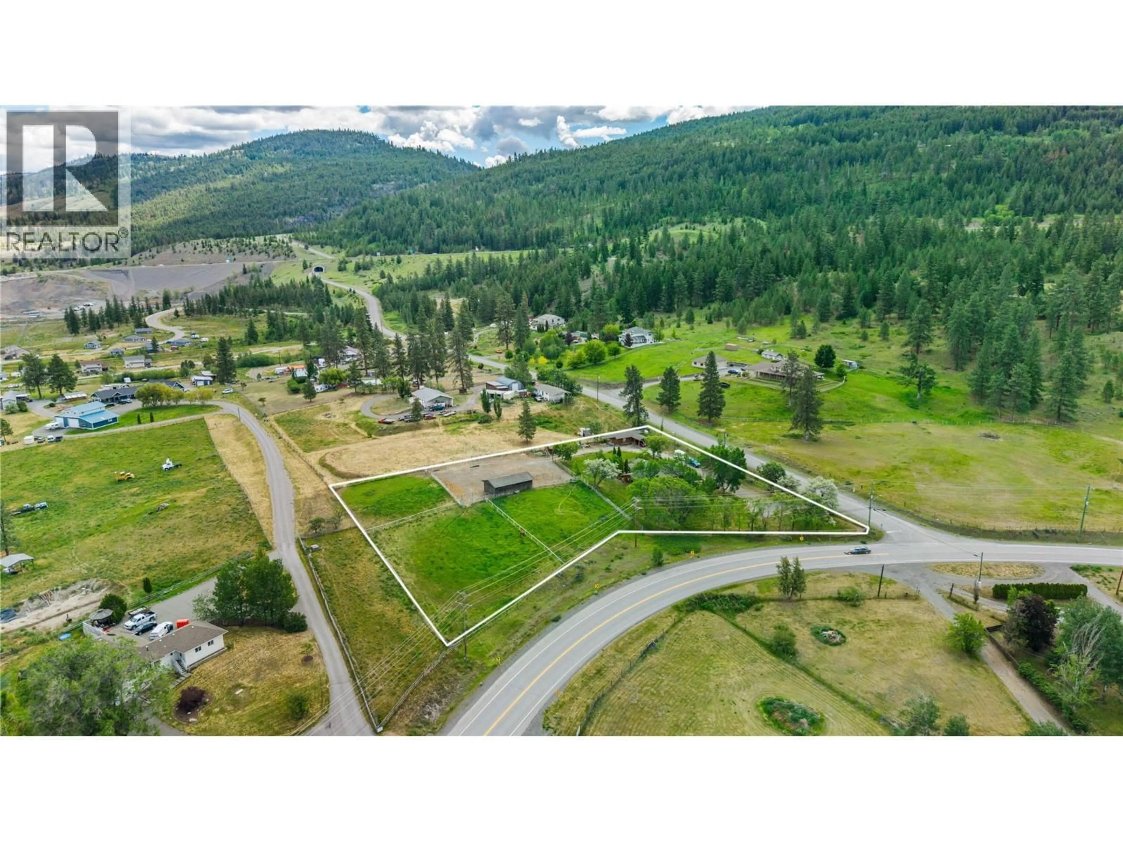 A pic from outside/outdoor area/front of a property/back of a property/a pic from drone, mountain view for 3069 FOX FARM ROAD, Merritt British Columbia V1K1B8