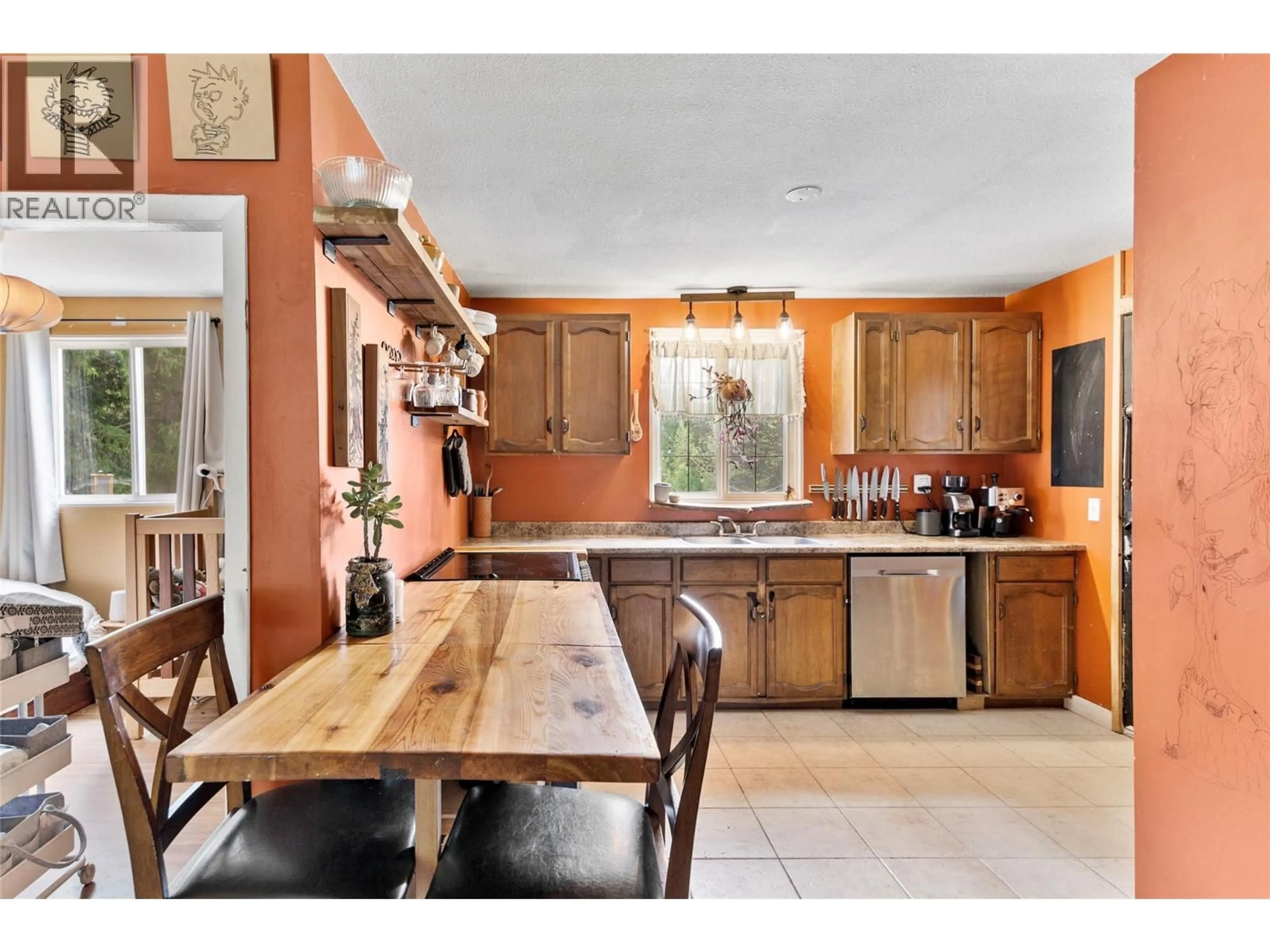 Open concept kitchen, ceramic/tile floor for 4752 LYBARGER ROAD, Malakwa British Columbia V0E2J0
