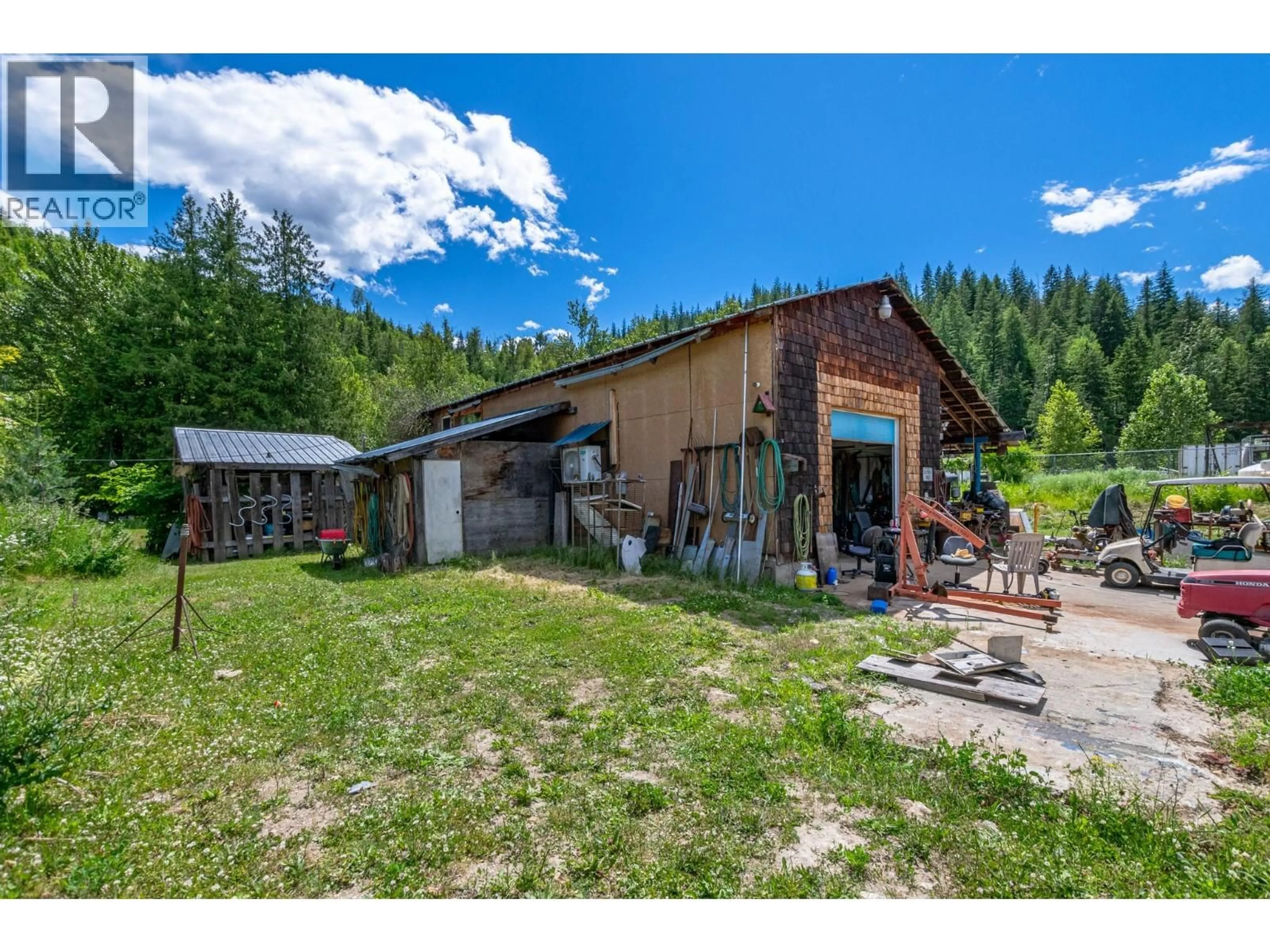 A pic from outside/outdoor area/front of a property/back of a property/a pic from drone, mountain view for 1940 TRANS CAN HIGHWAY, Sicamous British Columbia V0E2V0