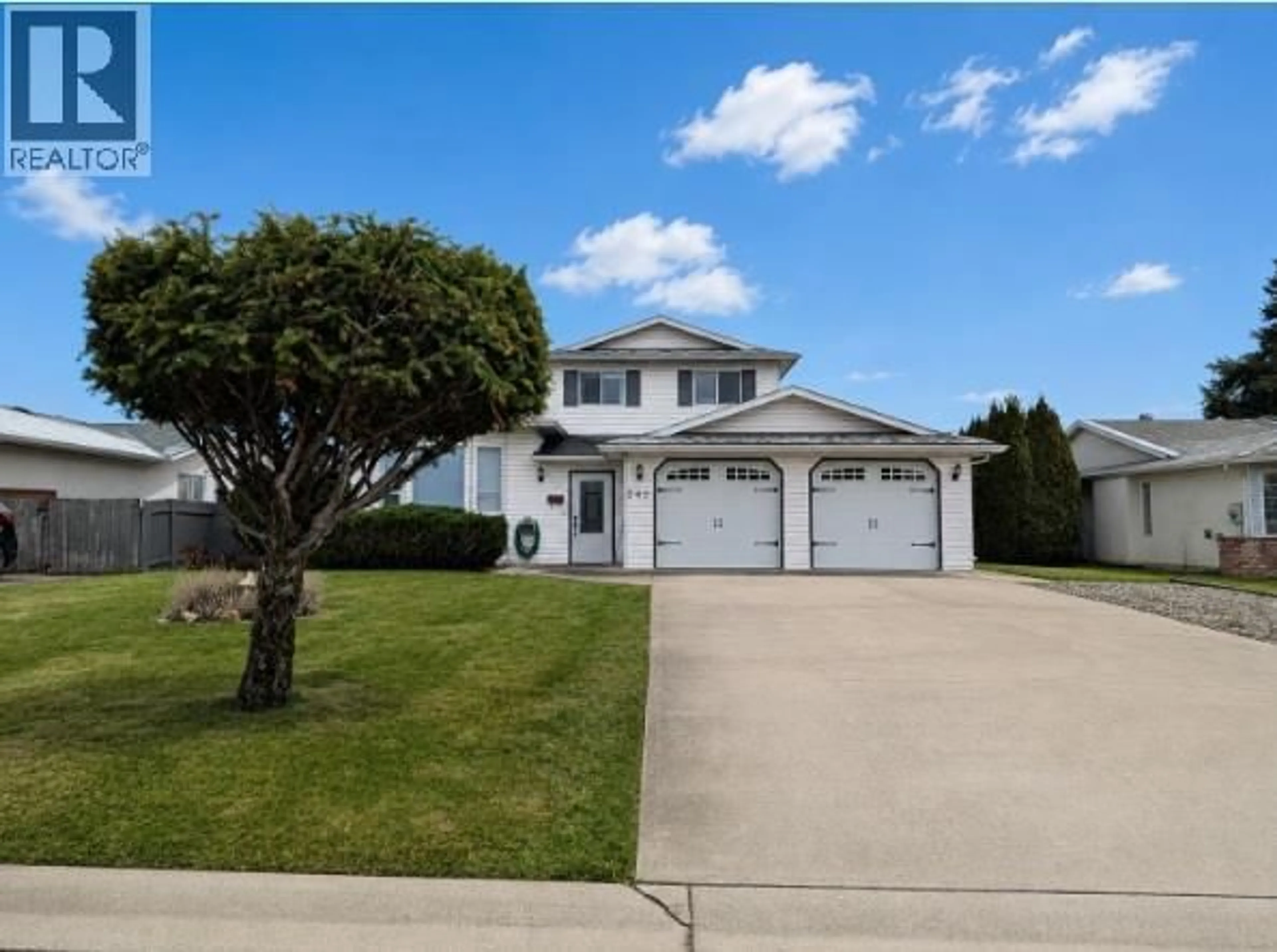 Home with vinyl exterior material, street for 245 FELIX ROAD, Kelowna British Columbia V1X6X8