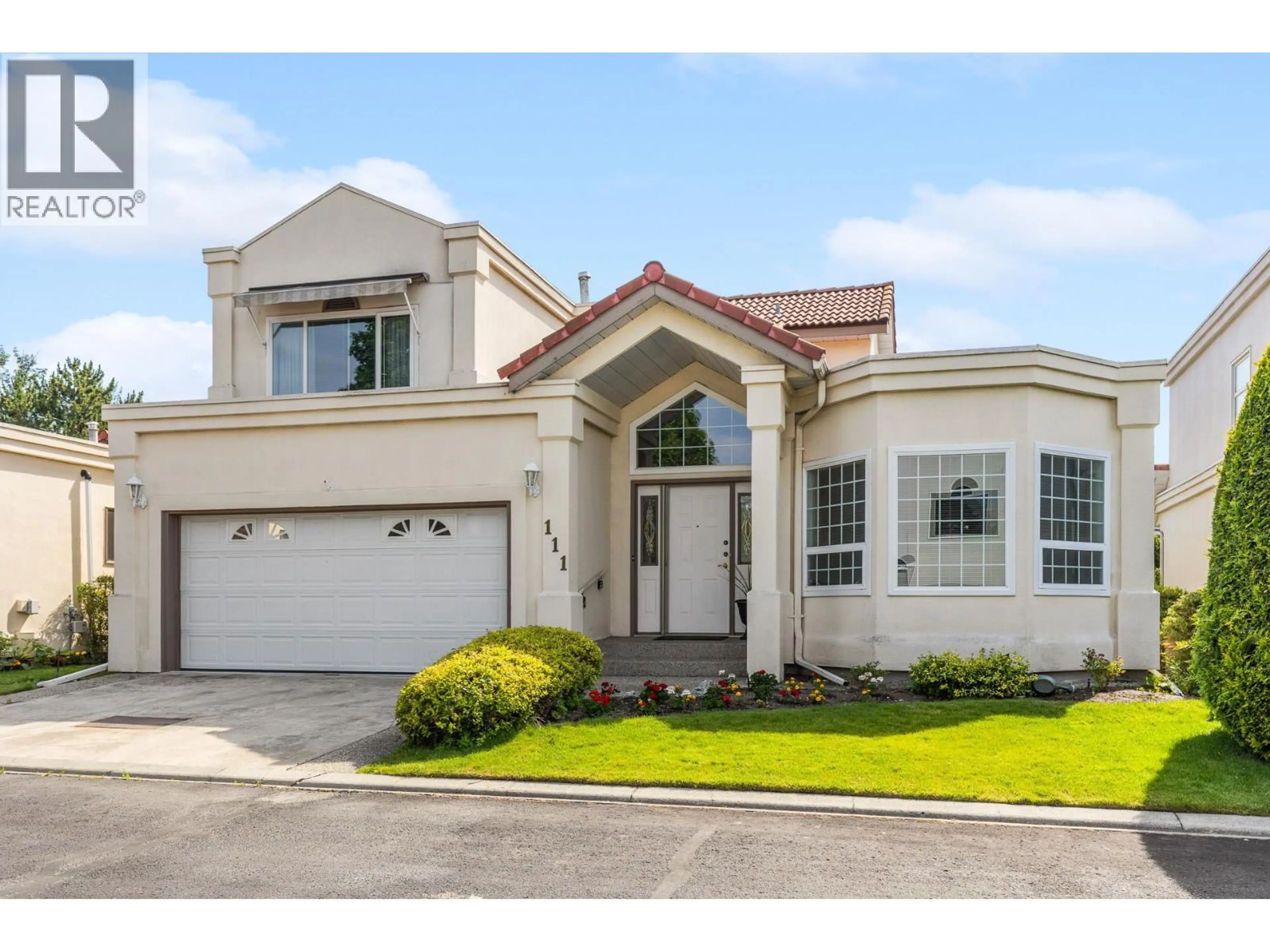 Home with vinyl exterior material, street for 111 - 650 LEXINGTON DRIVE, Kelowna British Columbia V1W3B6