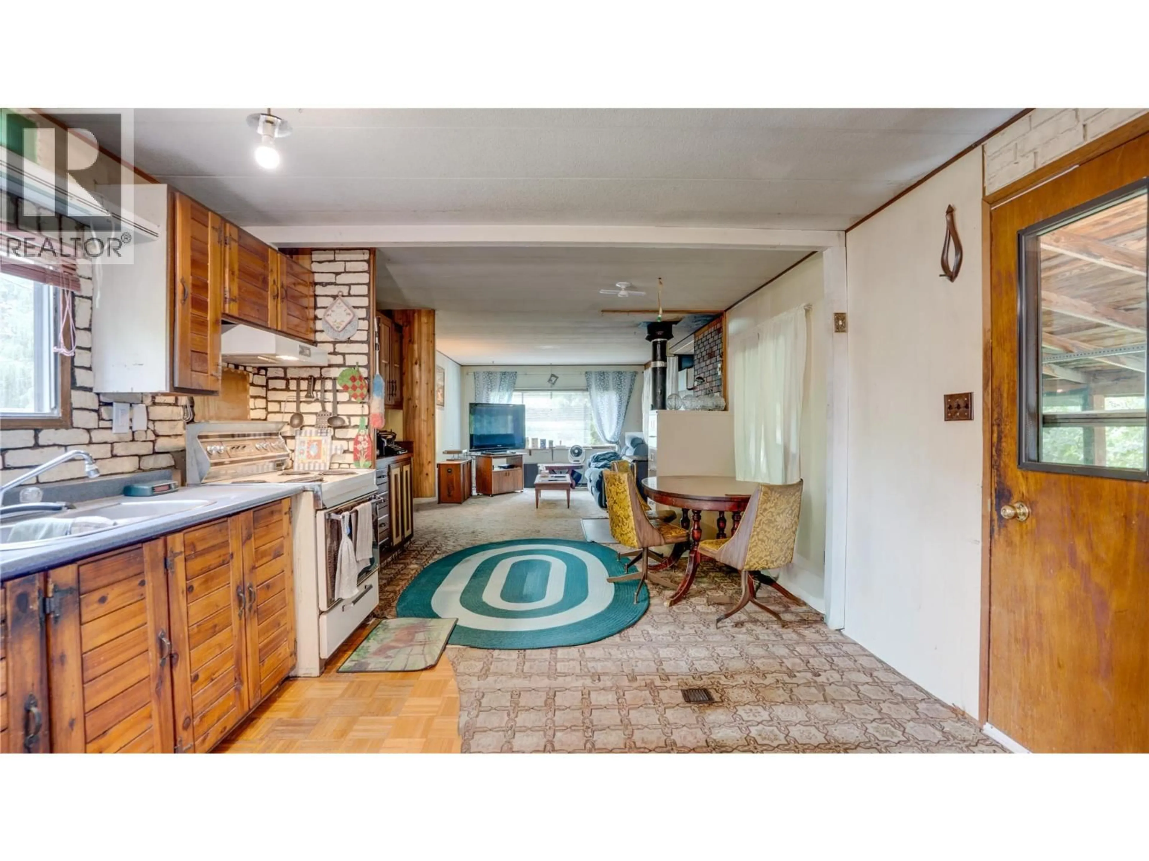 Open concept kitchen, ceramic/tile floor for 686 POWELL ROAD, Lumby British Columbia V0E2G7