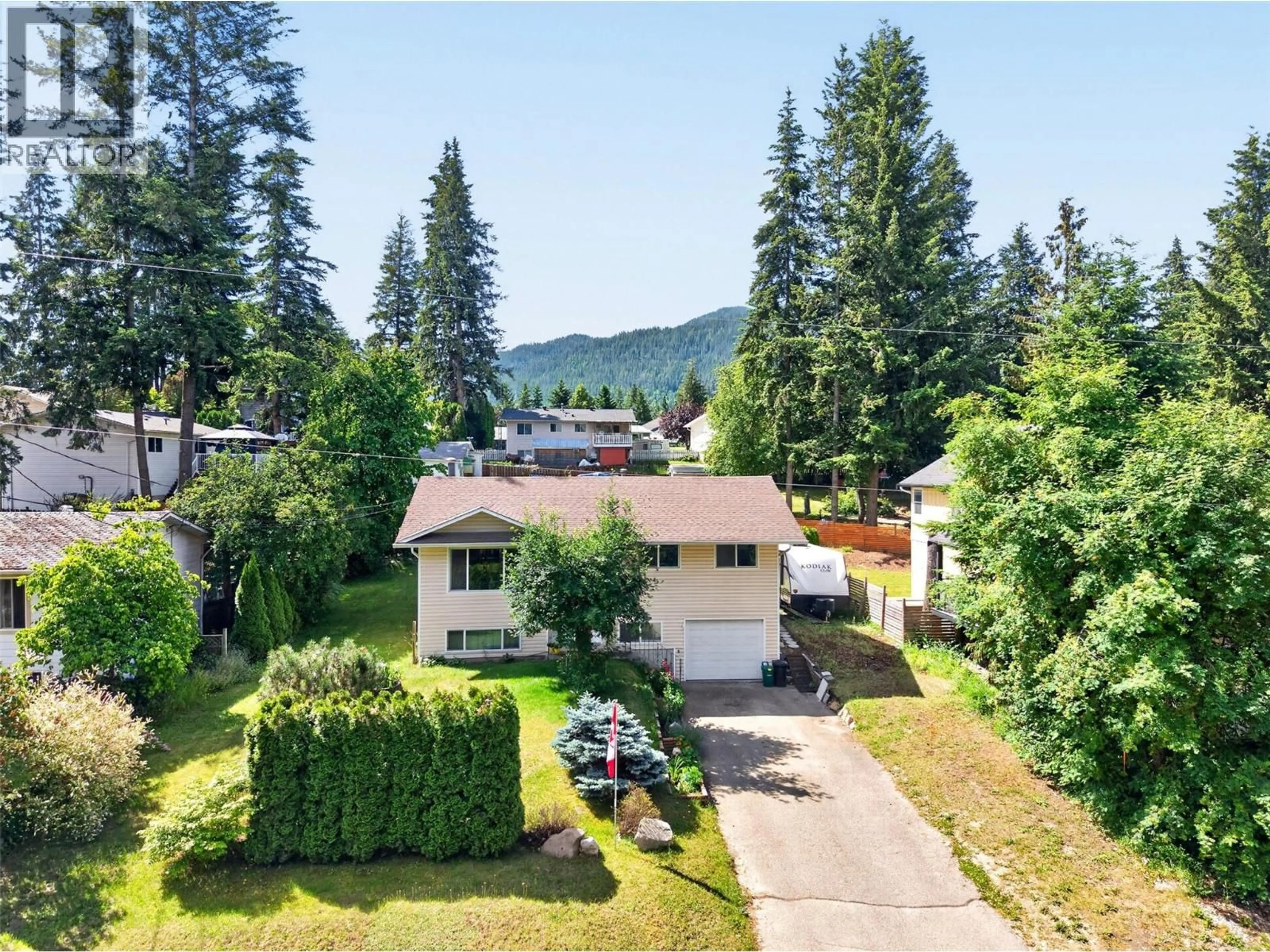 A pic from outside/outdoor area/front of a property/back of a property/a pic from drone, mountain view for 2250 AUTO ROAD SOUTHEAST, Salmon Arm British Columbia V1E1K5
