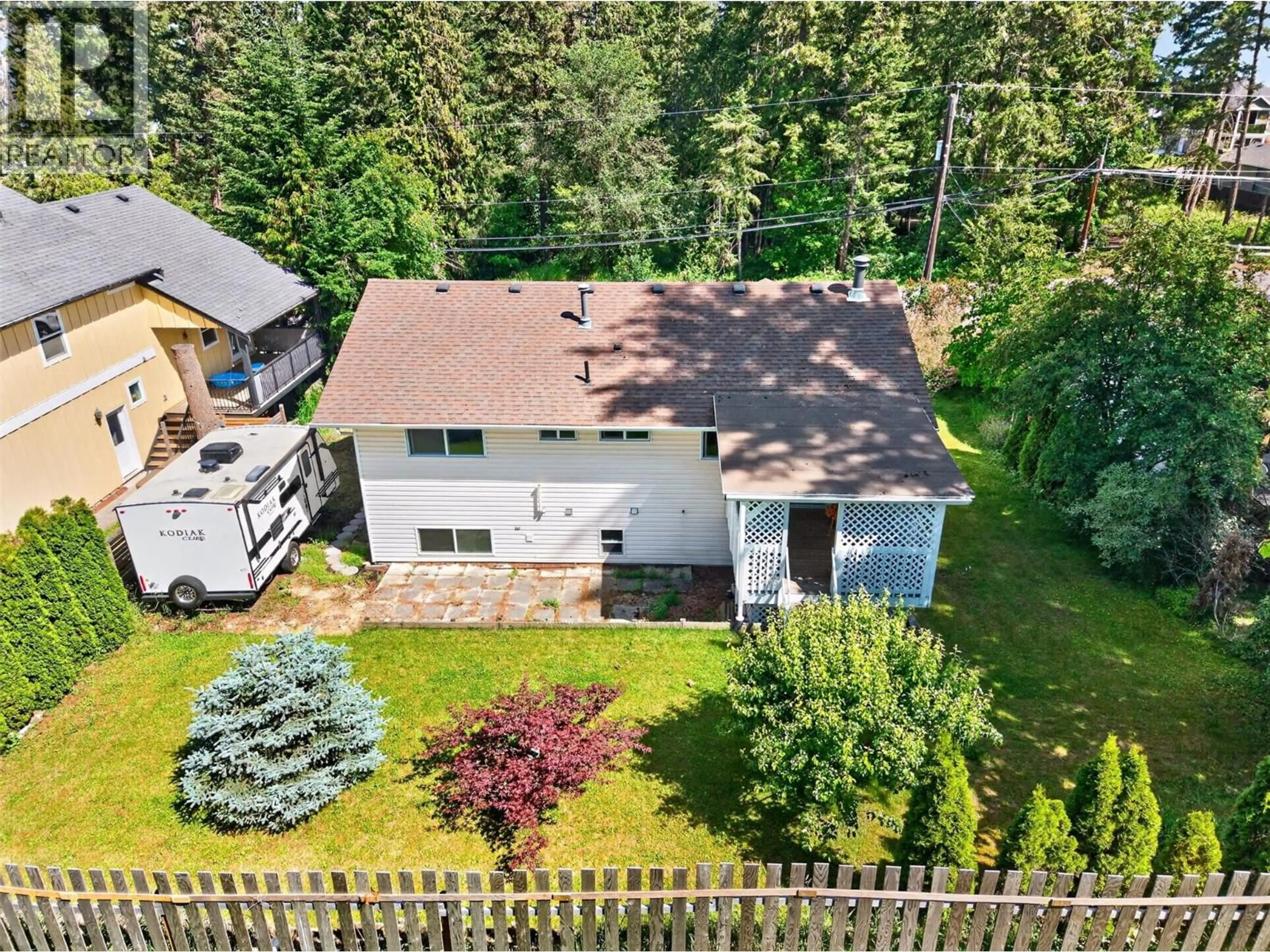 A pic from outside/outdoor area/front of a property/back of a property/a pic from drone, forest/trees view for 2250 AUTO ROAD SOUTHEAST, Salmon Arm British Columbia V1E1K5