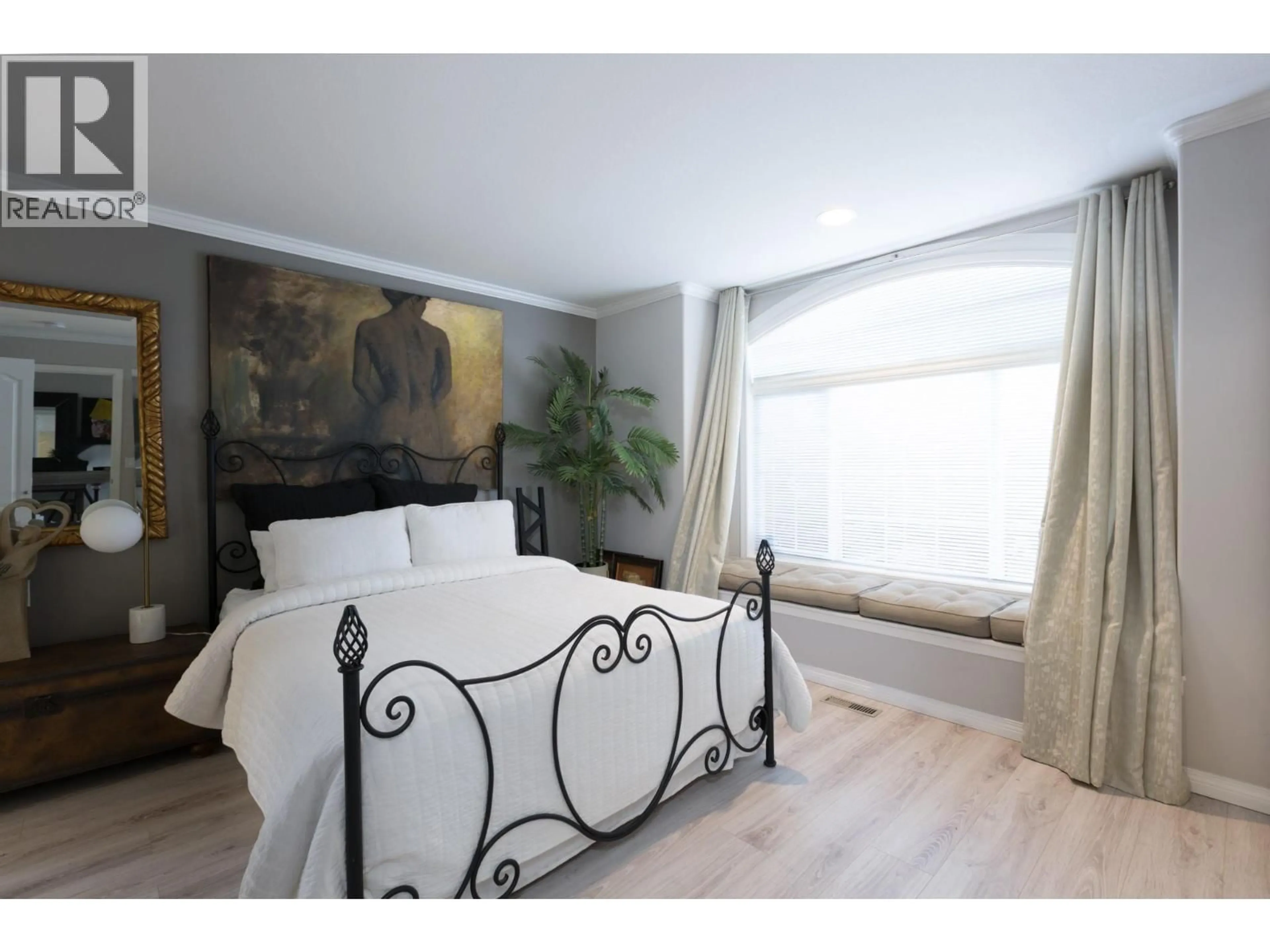 Bedroom with bed, wood/laminate floor for 3591 GLEN EAGLES DRIVE, West Kelowna British Columbia V4T2L5