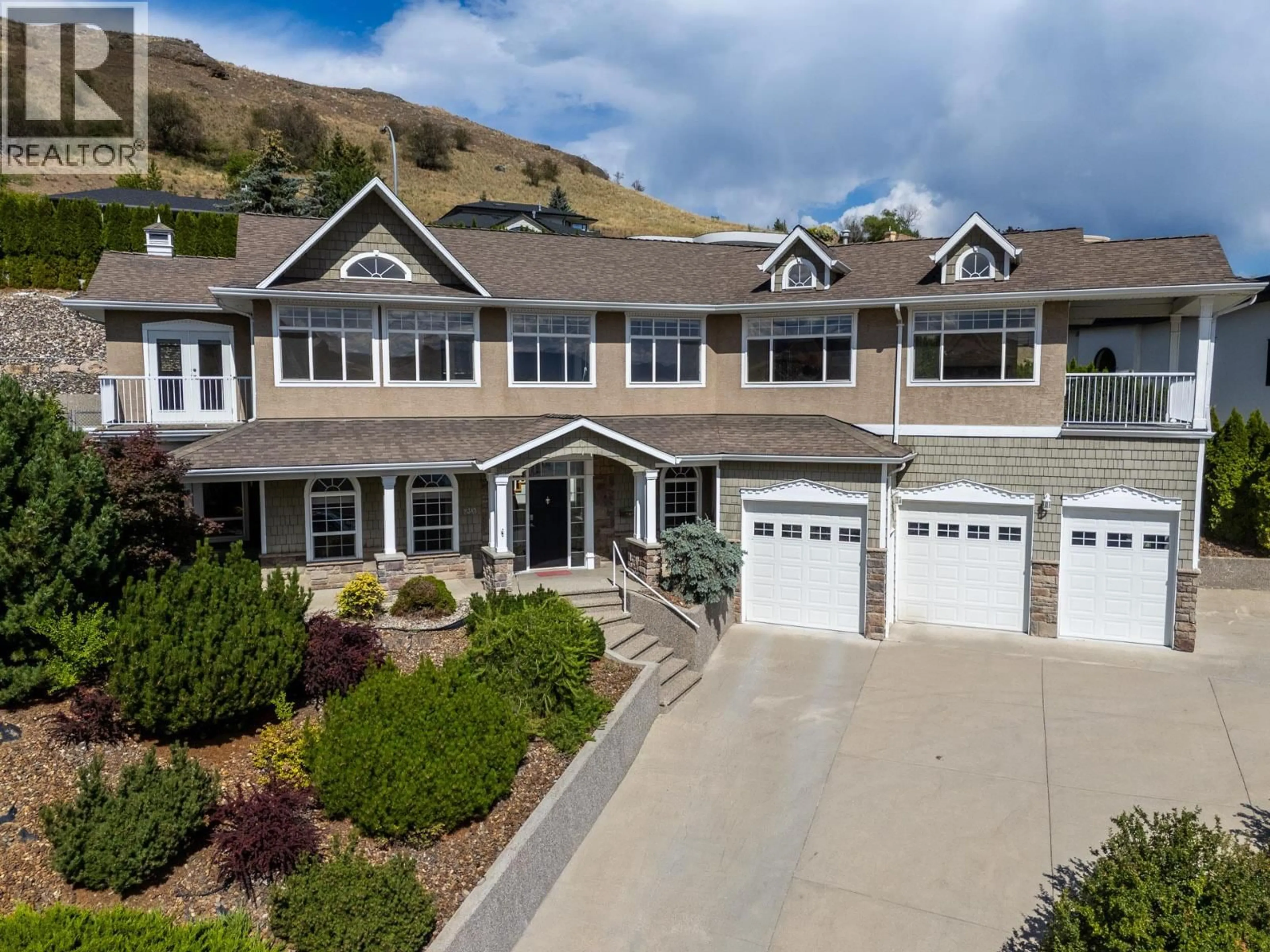 A pic from outside/outdoor area/front of a property/back of a property/a pic from drone, mountain view for 9313 ORCHARD RIDGE DRIVE, Coldstream British Columbia V1B1V8