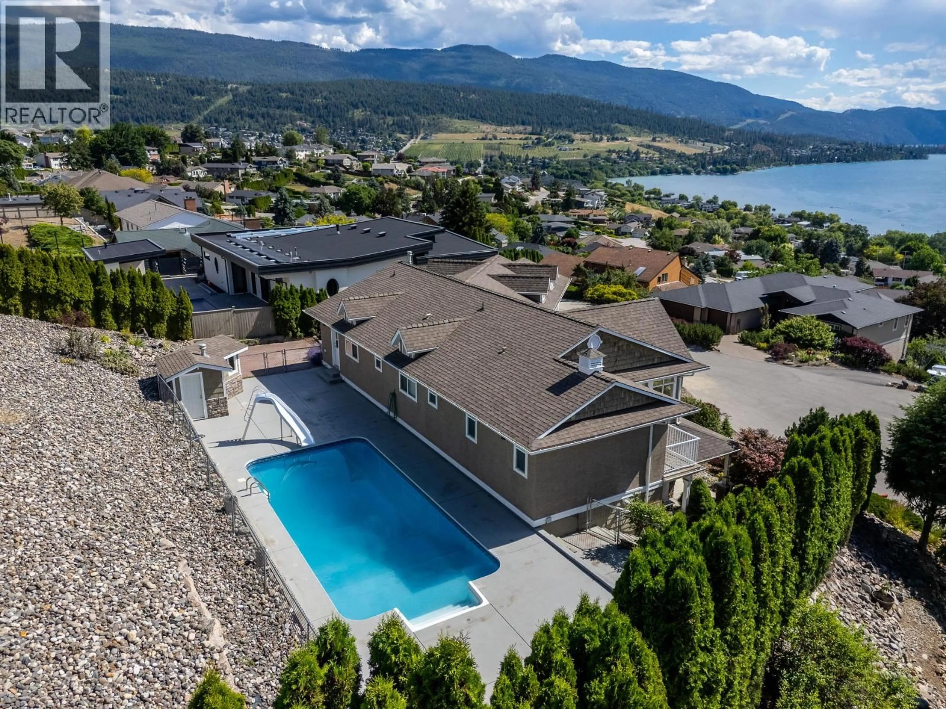 A pic from outside/outdoor area/front of a property/back of a property/a pic from drone, water/lake/river/ocean view for 9313 ORCHARD RIDGE DRIVE, Coldstream British Columbia V1B1V8