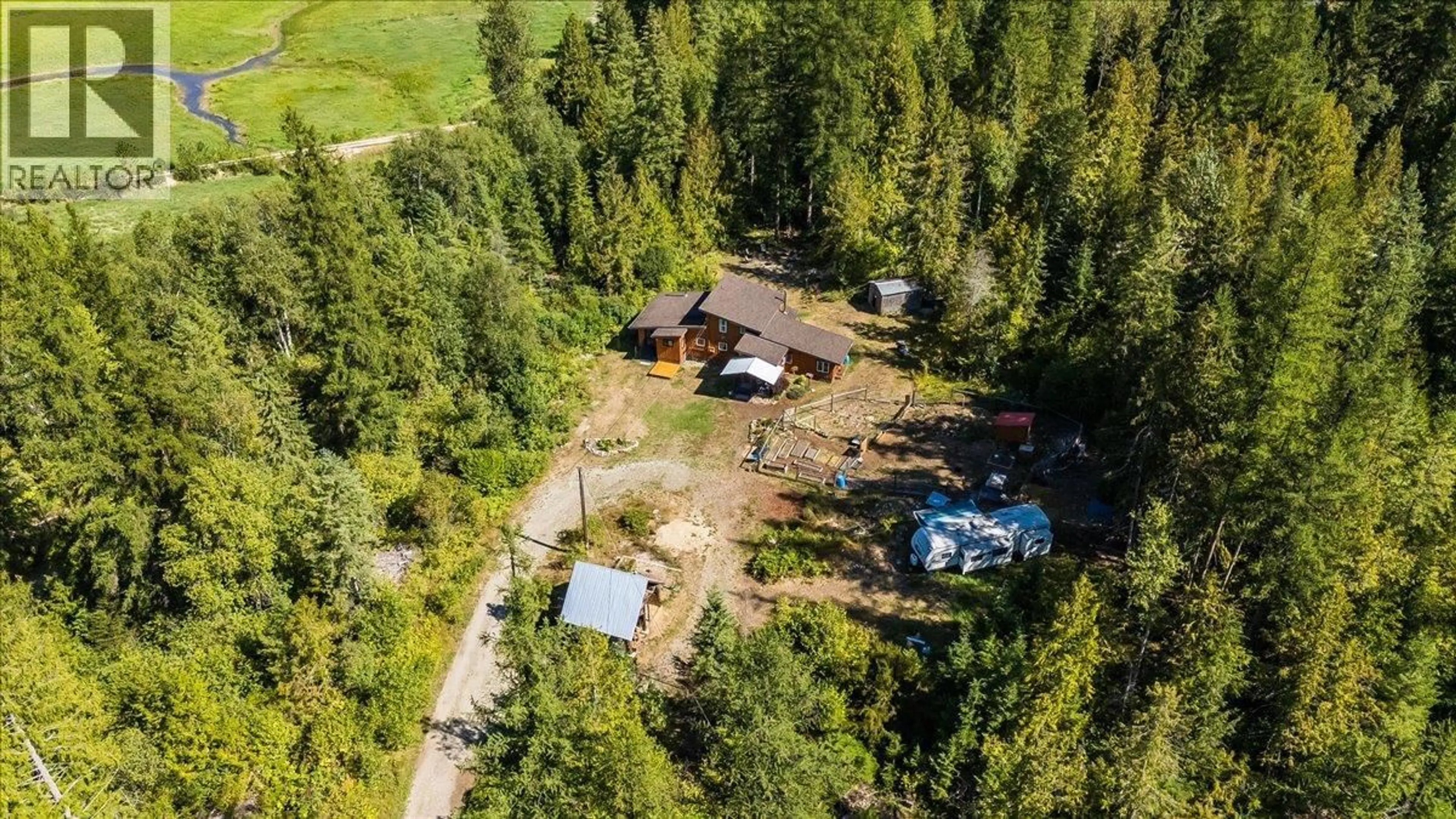 A pic from outside/outdoor area/front of a property/back of a property/a pic from drone, forest/trees view for 6582 NIXON ROAD, Appledale British Columbia V0G2J0