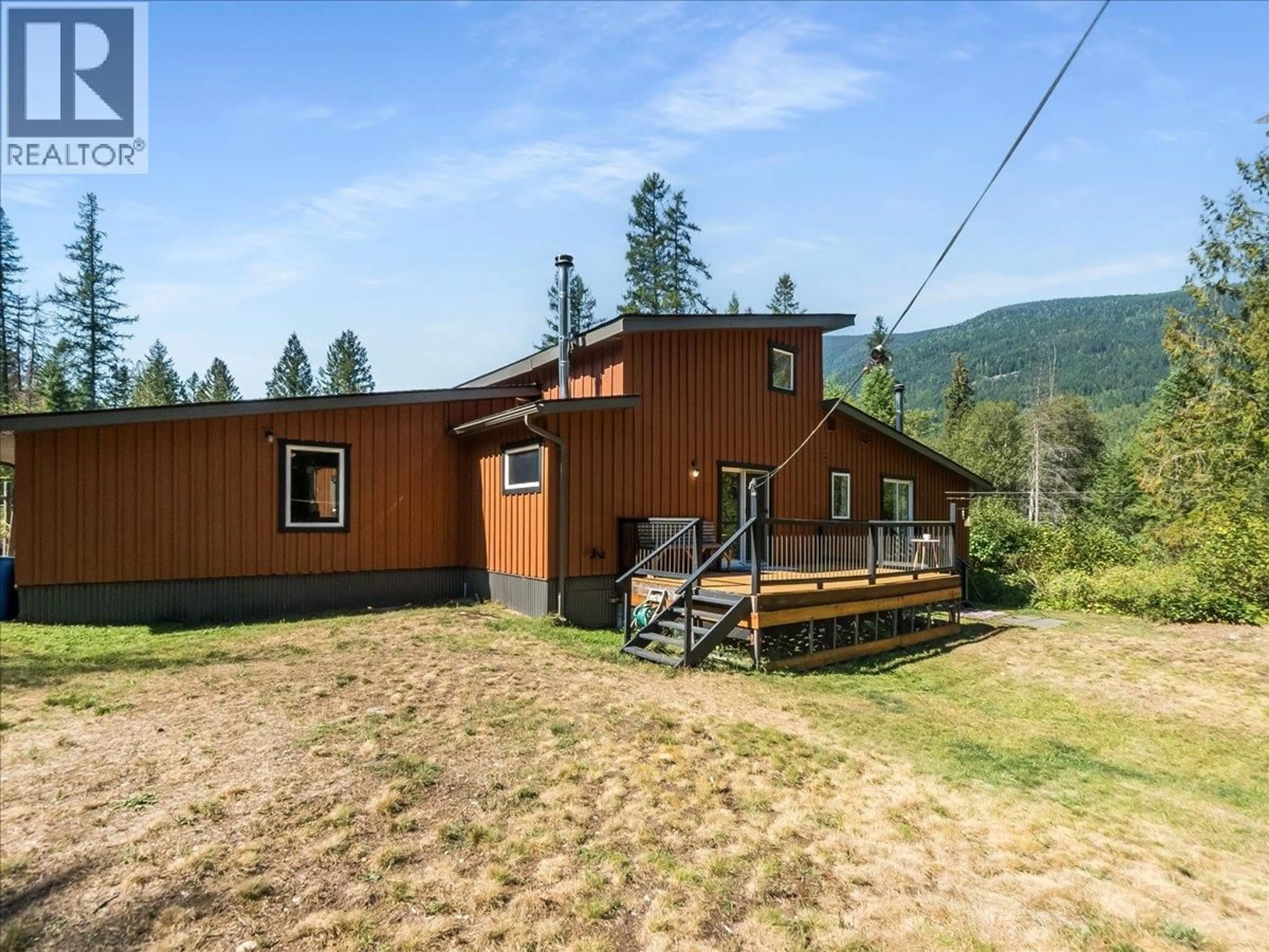 A pic from outside/outdoor area/front of a property/back of a property/a pic from drone, mountain view for 6582 NIXON ROAD, Appledale British Columbia V0G2J0