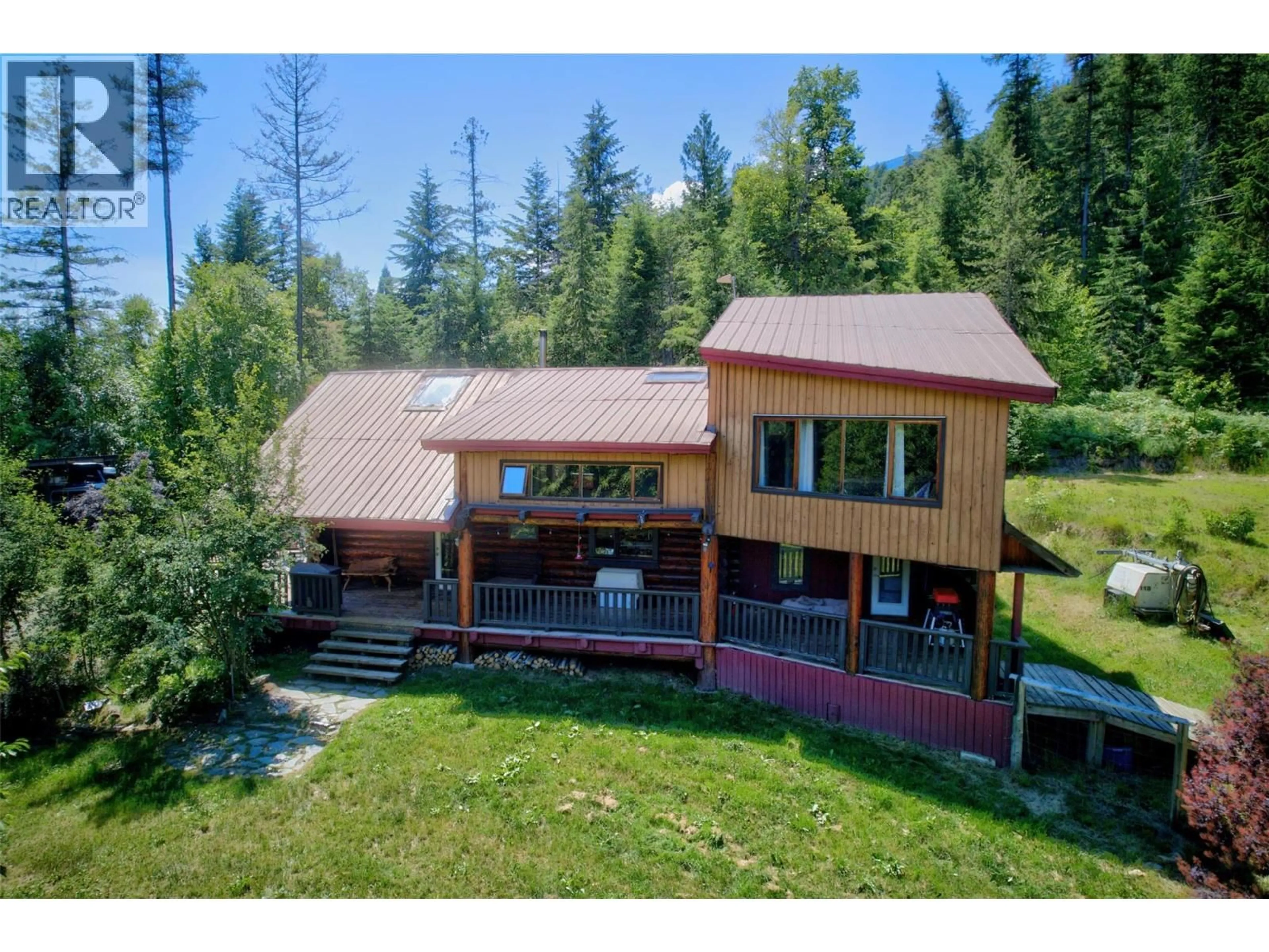 A pic from outside/outdoor area/front of a property/back of a property/a pic from drone, unknown for 9413 SHUTTY BENCH ROAD, Kaslo British Columbia V0G1M0