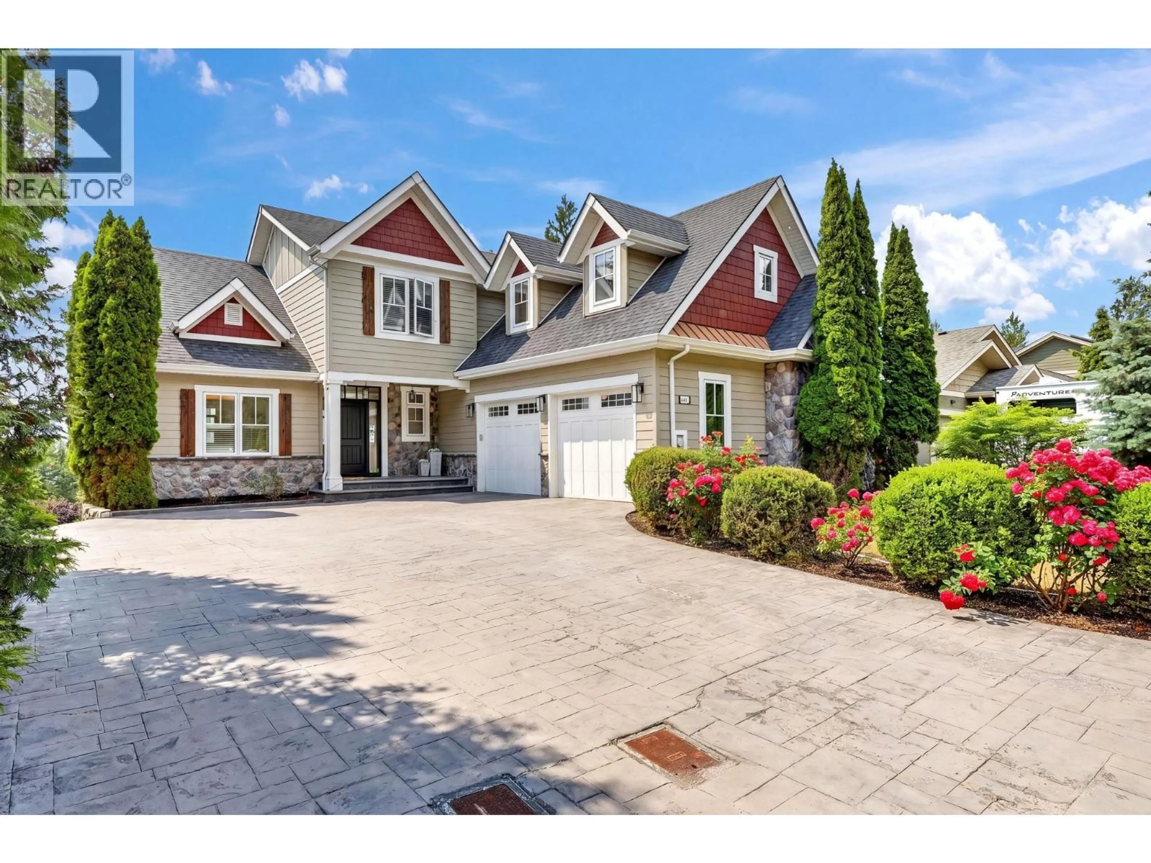 Home with vinyl exterior material, street for 2417 TALLUS RIDGE DRIVE, West Kelowna British Columbia V4T3A6