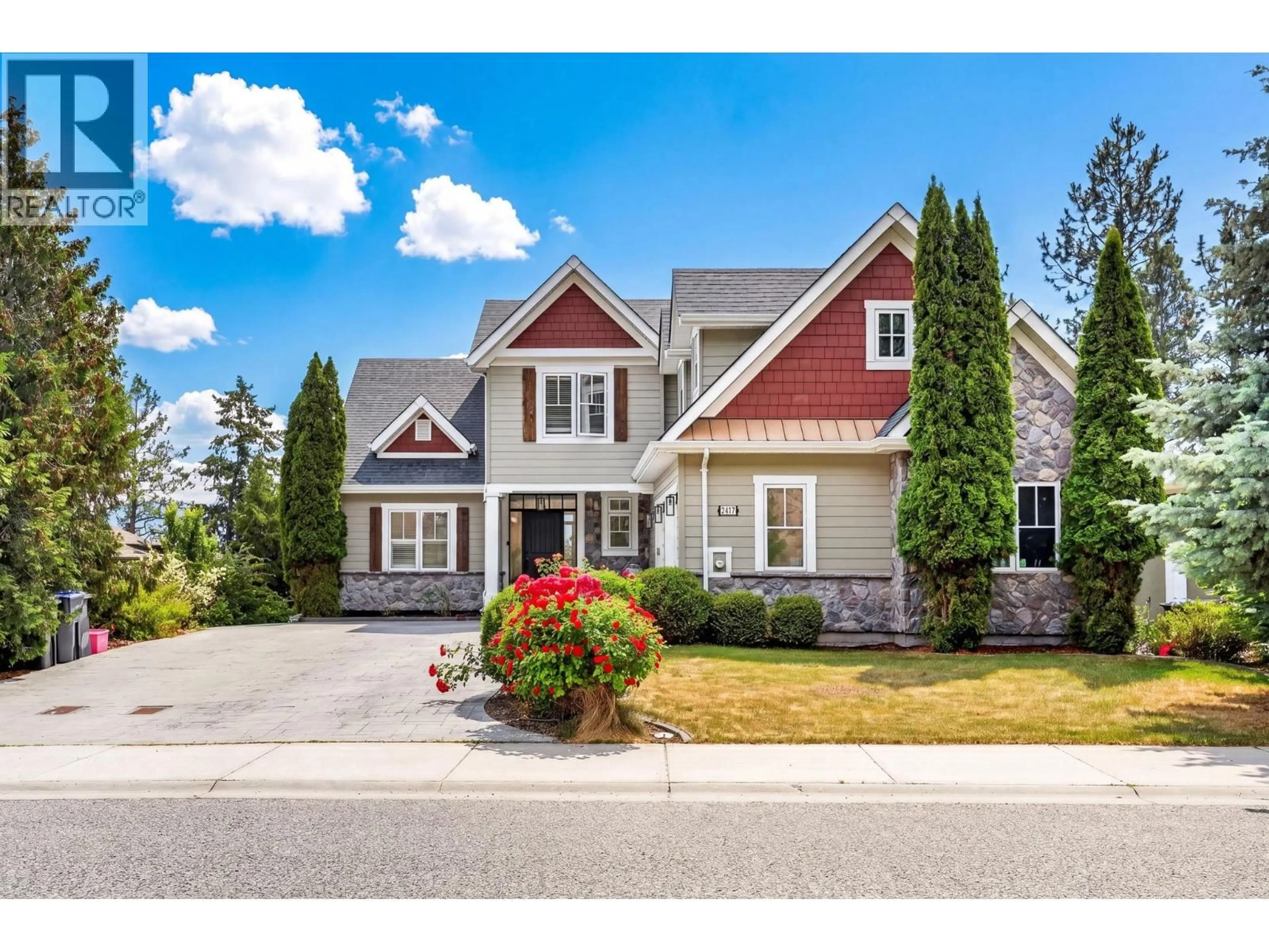 Home with brick exterior material, street for 2417 TALLUS RIDGE DRIVE, West Kelowna British Columbia V4T3A6
