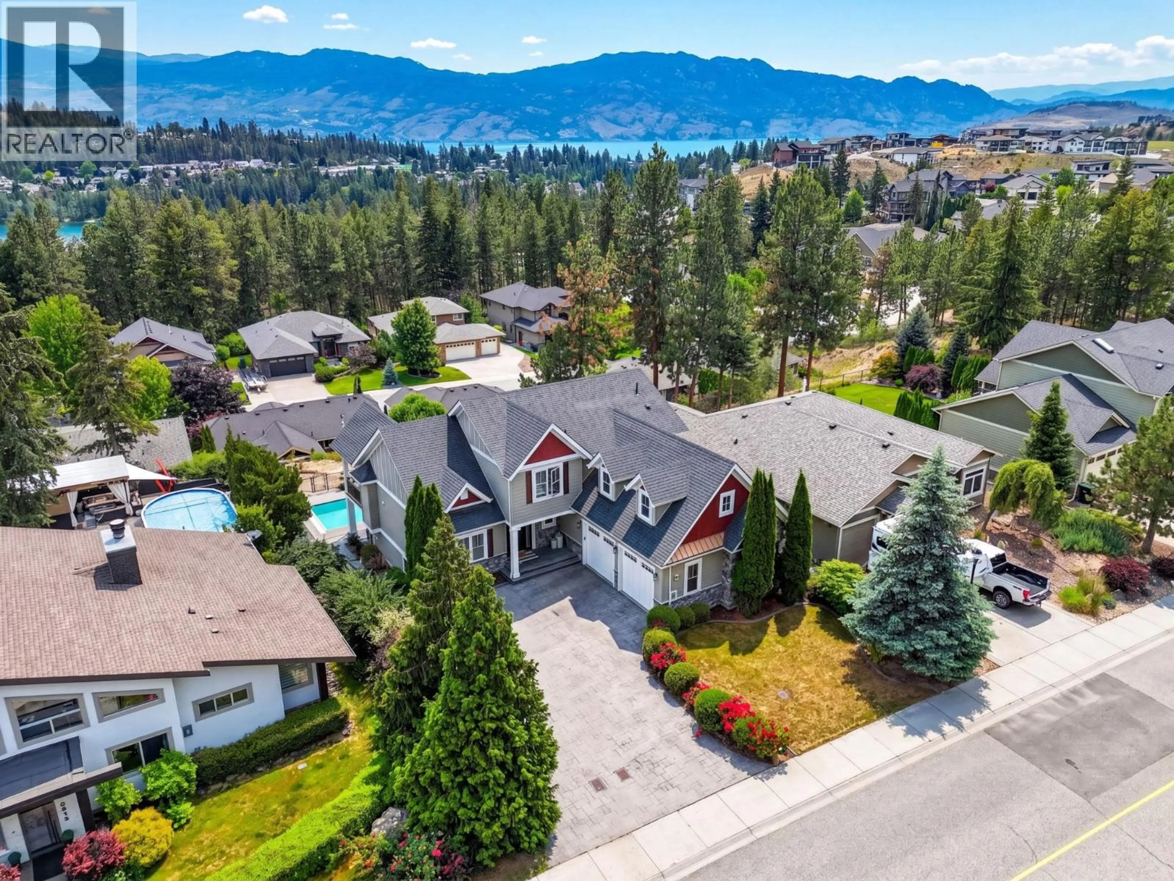 A pic from outside/outdoor area/front of a property/back of a property/a pic from drone, mountain view for 2417 TALLUS RIDGE DRIVE, West Kelowna British Columbia V4T3A6