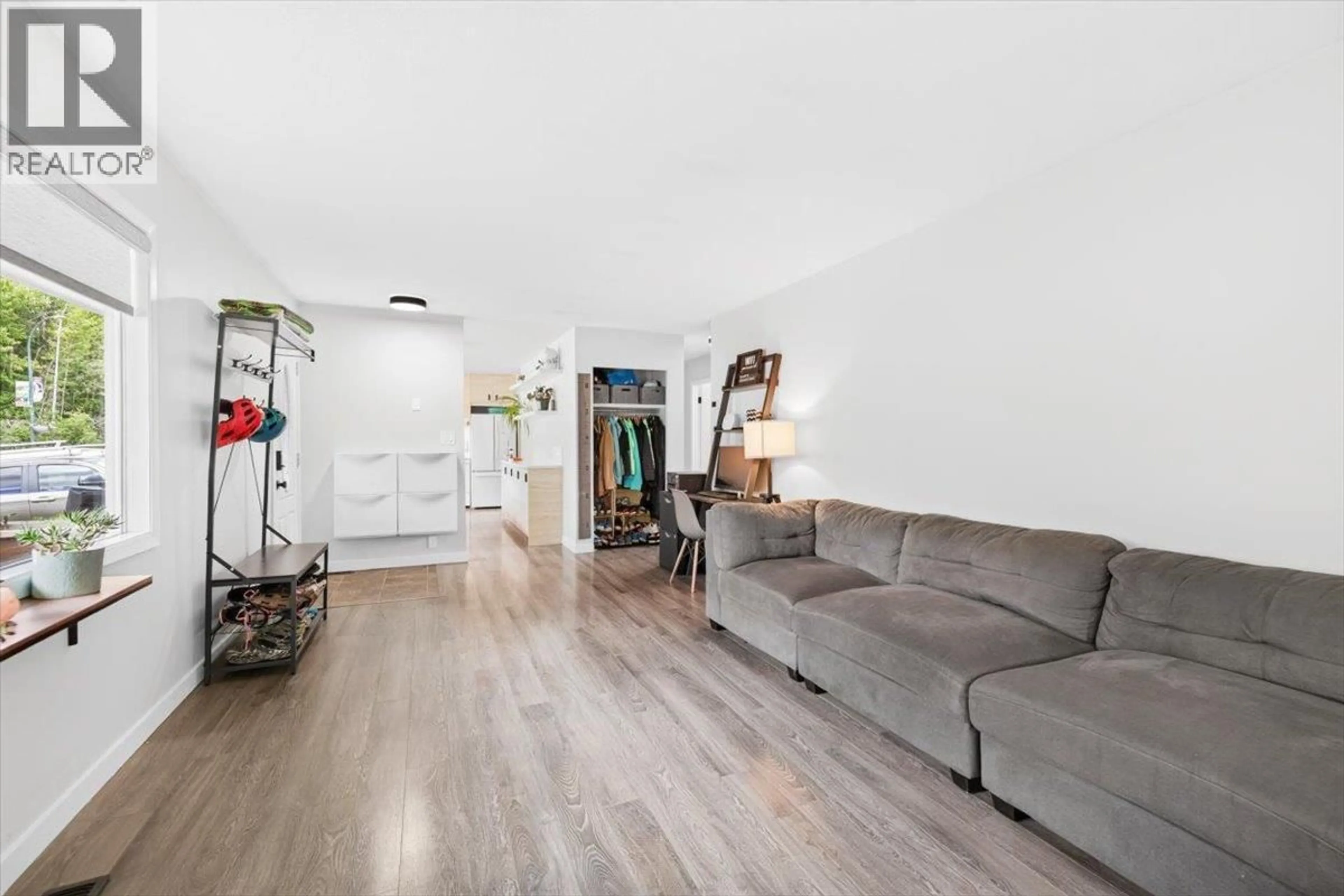 Living room with furniture, wood/laminate floor for 316 ALPINE PLACE, Sparwood British Columbia V0B2G0