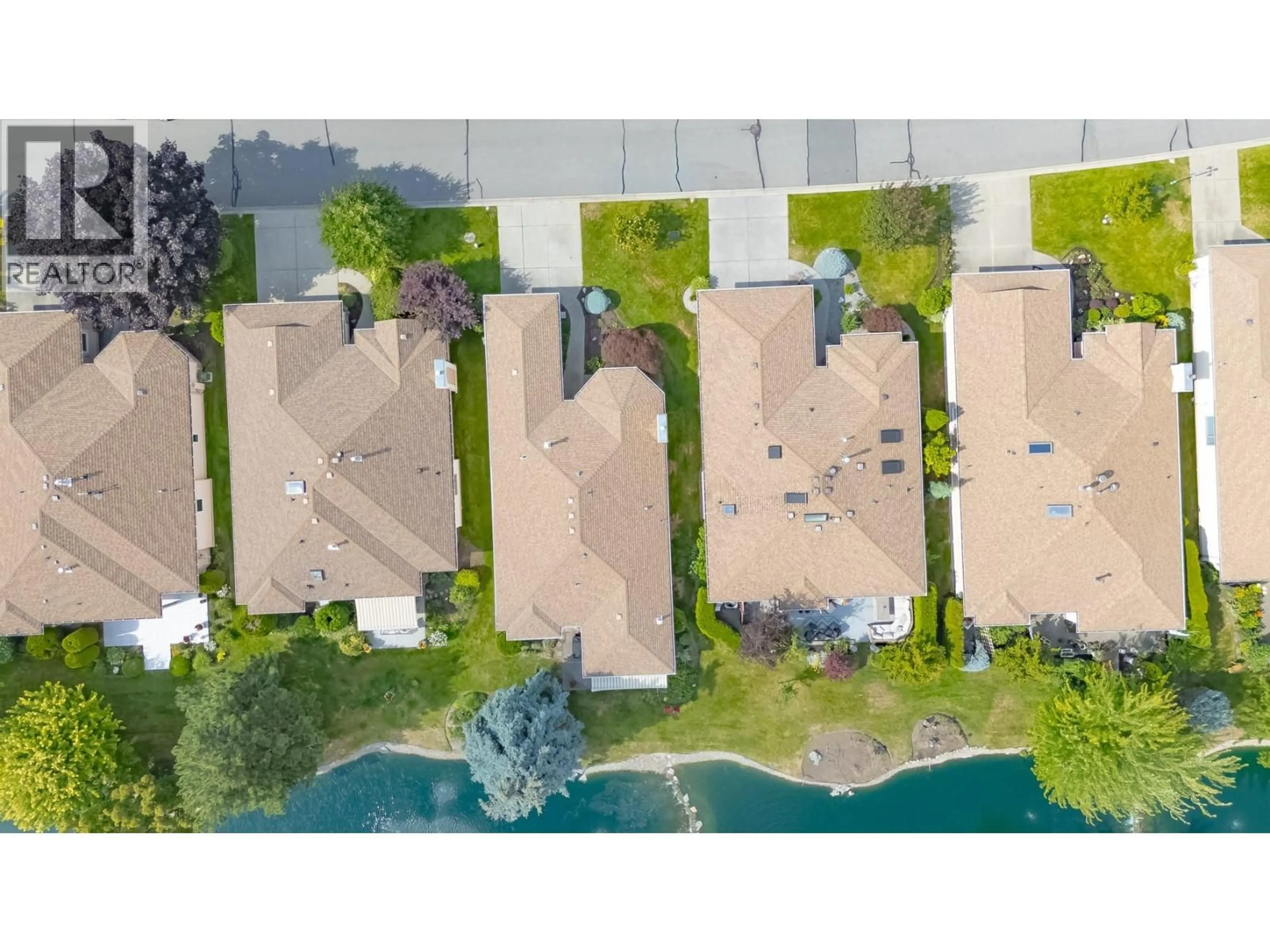 A pic from outside/outdoor area/front of a property/back of a property/a pic from drone, water/lake/river/ocean view for 180 - 1201 CAMERON AVENUE, Kelowna British Columbia V1W3S2