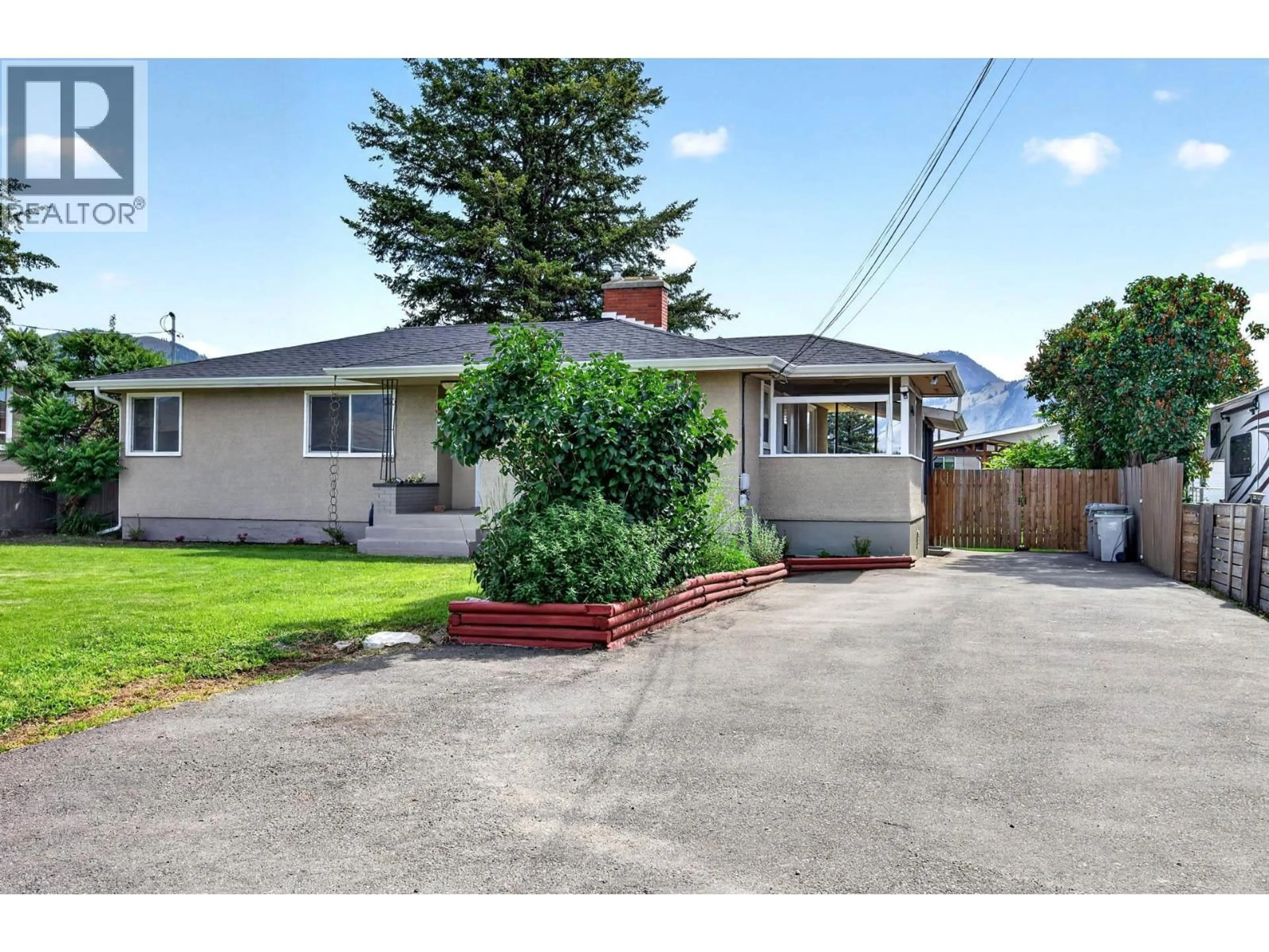 A pic from outside/outdoor area/front of a property/back of a property/a pic from drone, street for 765 KELLY DRIVE, Kamloops British Columbia V2B4G5