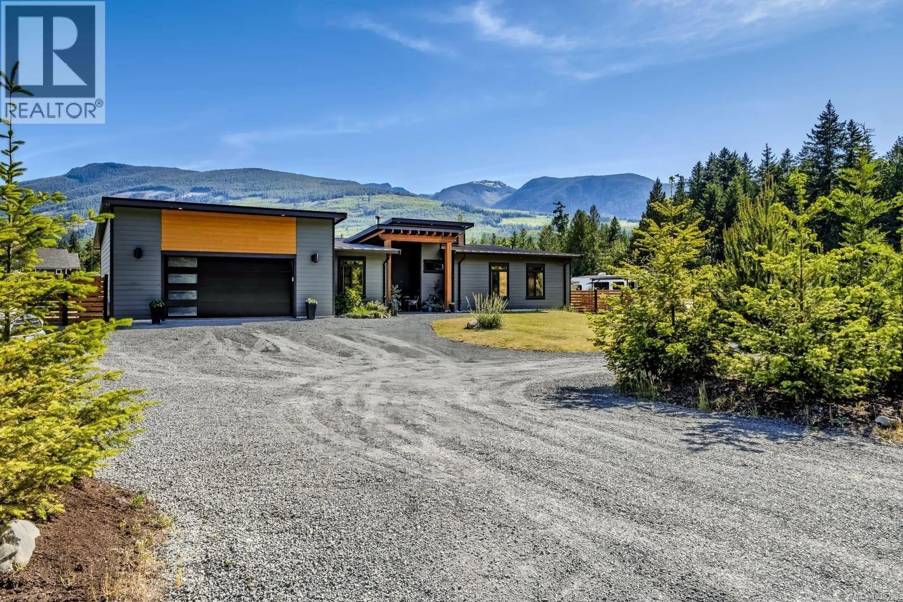 A pic from outside/outdoor area/front of a property/back of a property/a pic from drone, mountain view for 3770 TRALEE ROAD, Whiskey Creek British Columbia V9K1V6