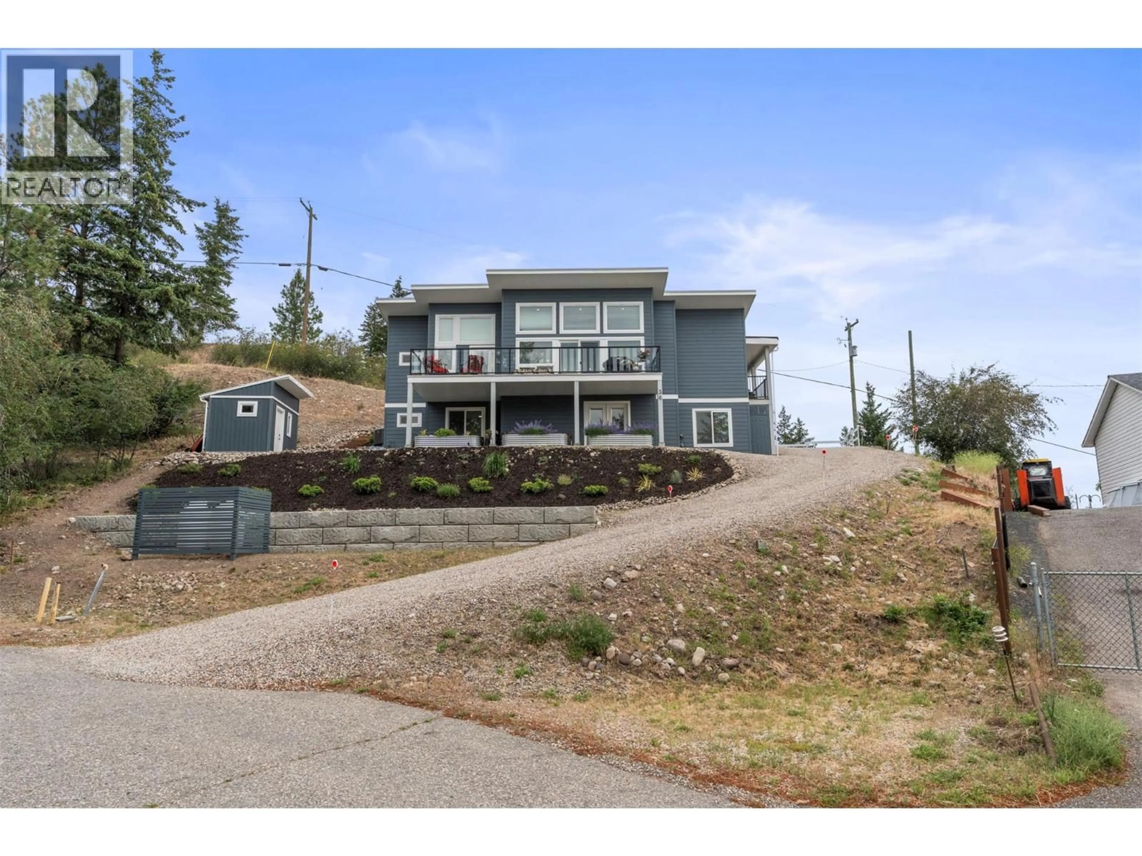 A pic from outside/outdoor area/front of a property/back of a property/a pic from drone, unknown for 36 SPRUCE DRIVE, Vernon British Columbia V1H2B9