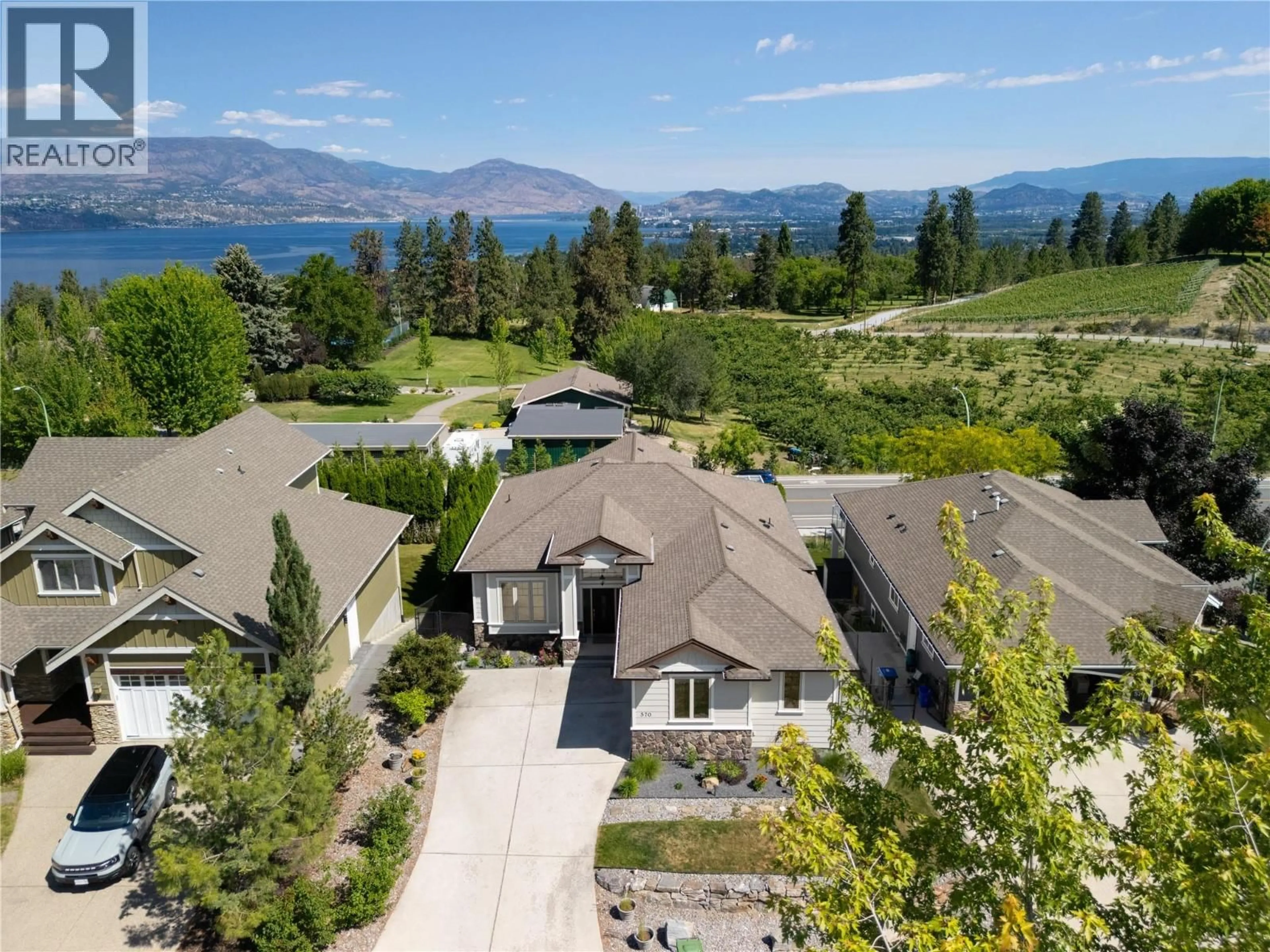 A pic from outside/outdoor area/front of a property/back of a property/a pic from drone, mountain view for 570 GOWEN PLACE, Kelowna British Columbia V1W5B4