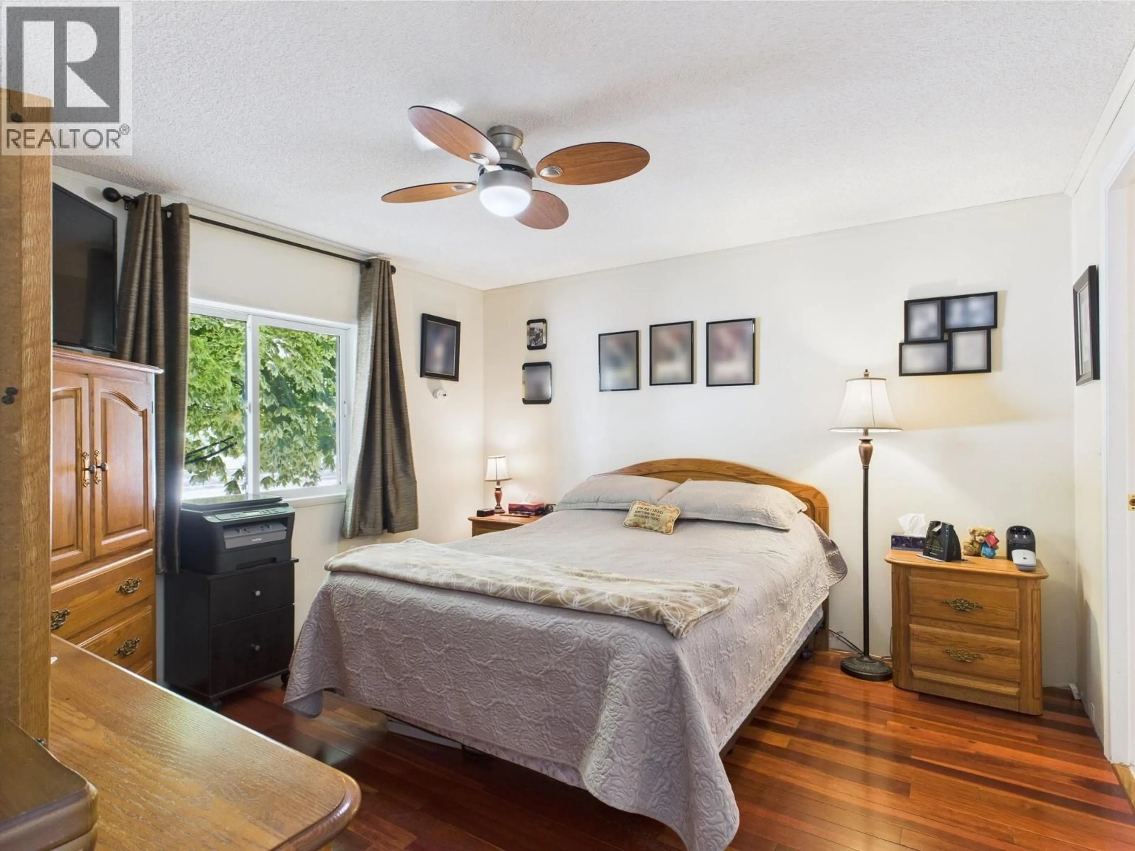 Bedroom with bed, wood/laminate floor for 12 - 30 CACTUS CRESCENT, Osoyoos British Columbia V0H1V1
