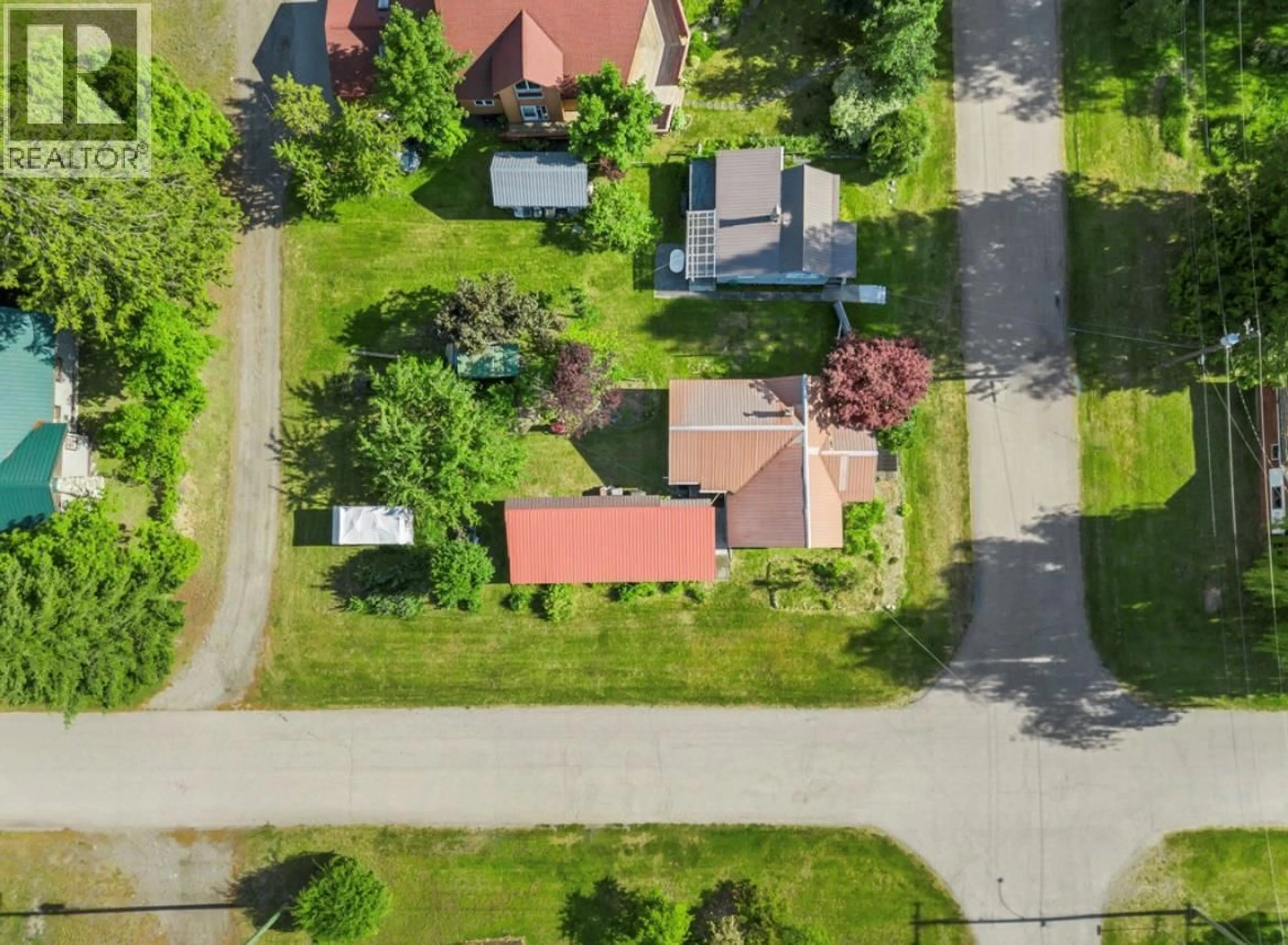 A pic from outside/outdoor area/front of a property/back of a property/a pic from drone, street for 112 JOSEPHINE STREET, New Denver British Columbia V0G1S0