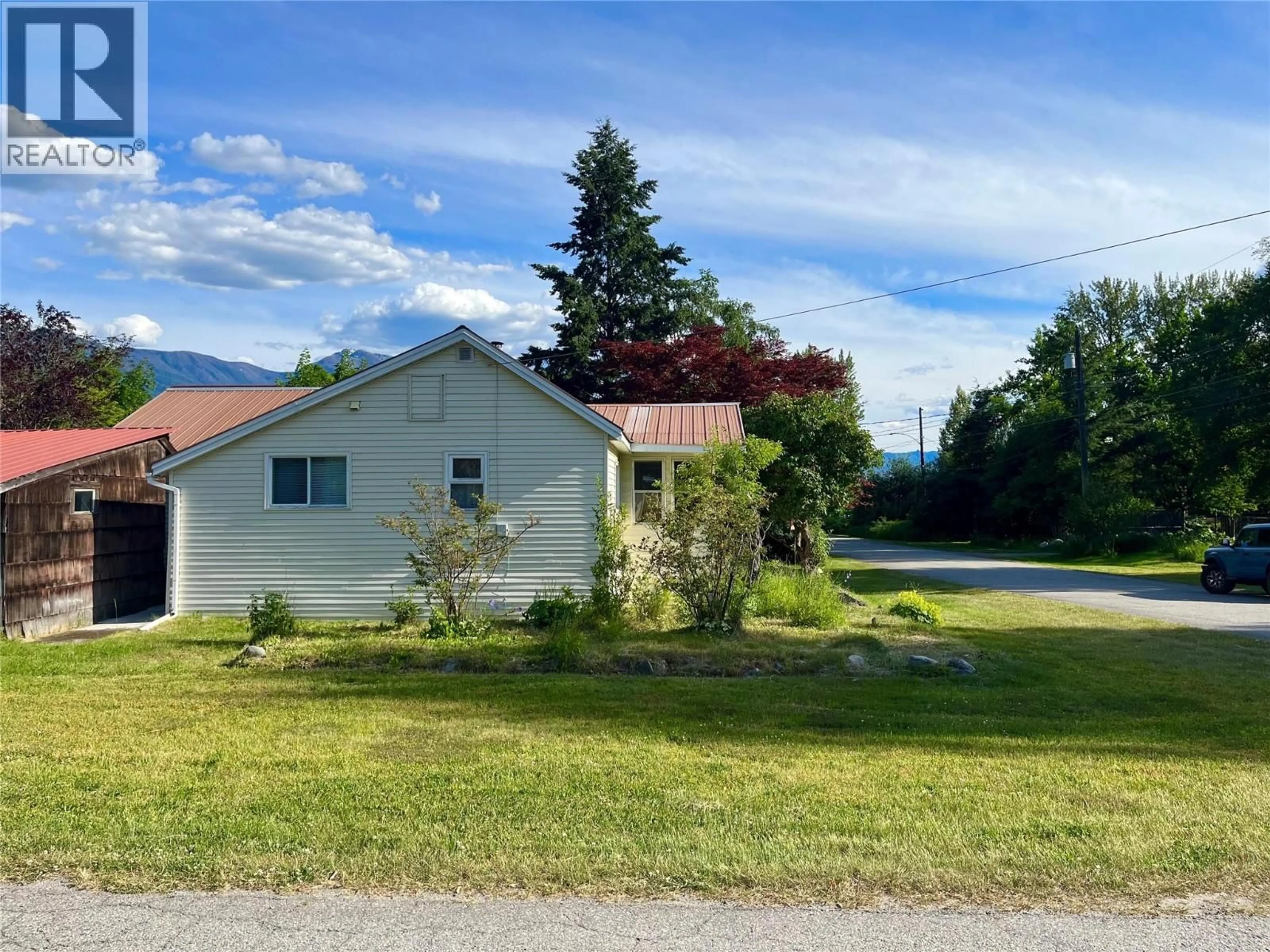 A pic from outside/outdoor area/front of a property/back of a property/a pic from drone, mountain view for 112 JOSEPHINE STREET, New Denver British Columbia V0G1S0