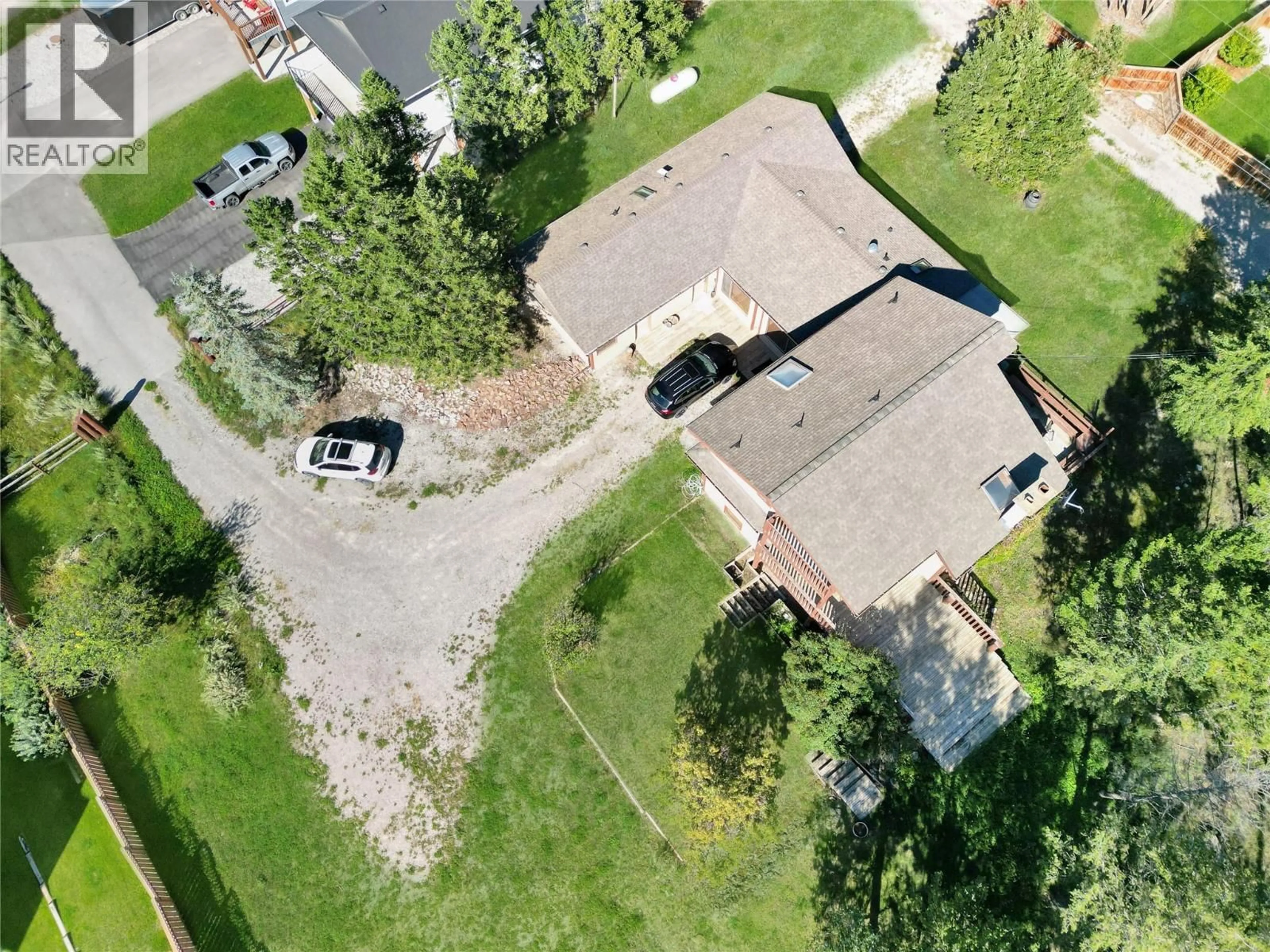 A pic from outside/outdoor area/front of a property/back of a property/a pic from drone, street for 7560 JACKSON AVENUE, Radium Hot Springs British Columbia V0A1M0