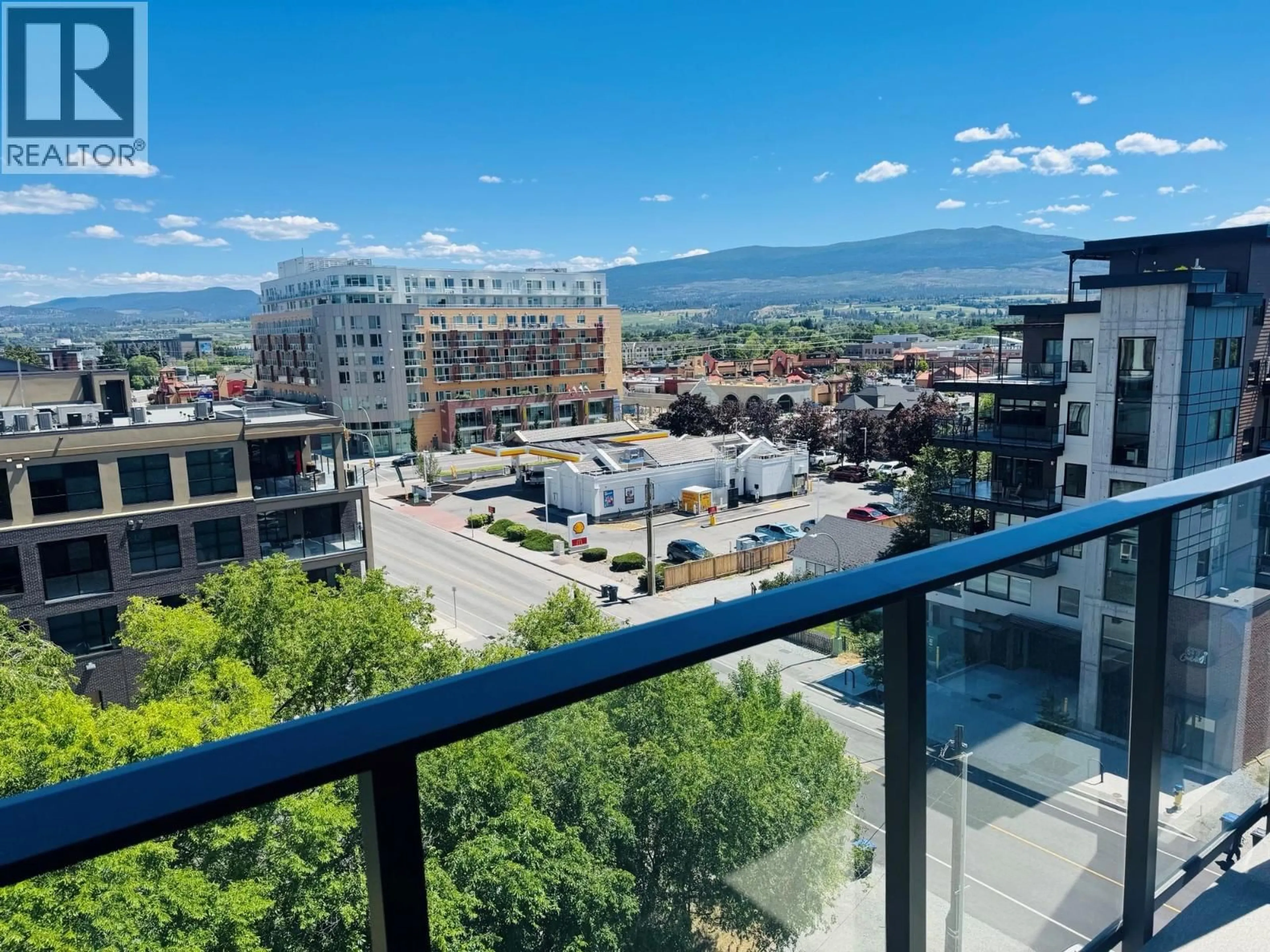 Balcony in the apartment, city buildings view from balcony for 609 - 3051 ABBOTT STREET, Kelowna British Columbia V1Y0P1