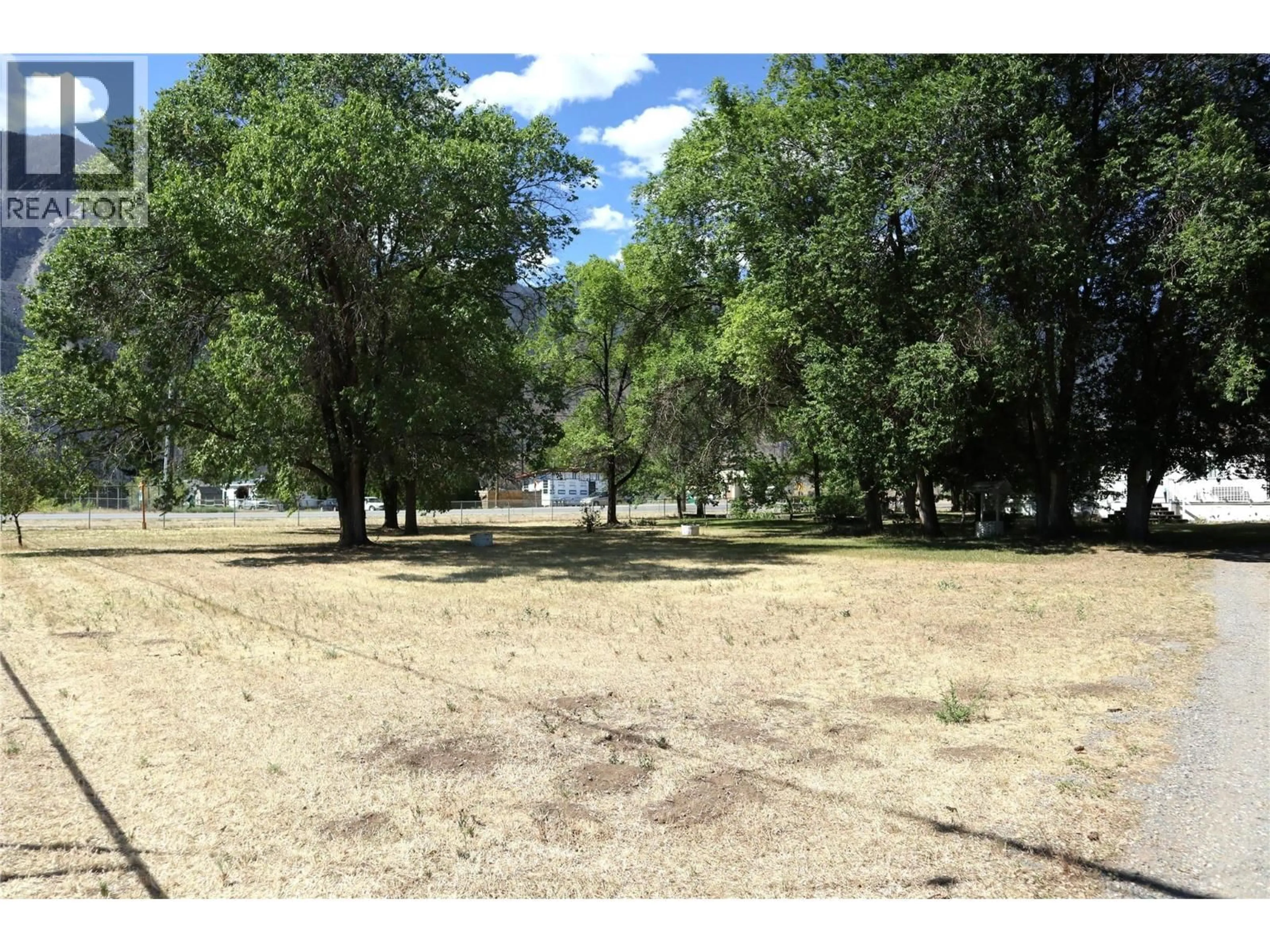 A pic from outside/outdoor area/front of a property/back of a property/a pic from drone, forest/trees view for 604 SCHNEIDER ROAD, Keremeos British Columbia V0X1N5