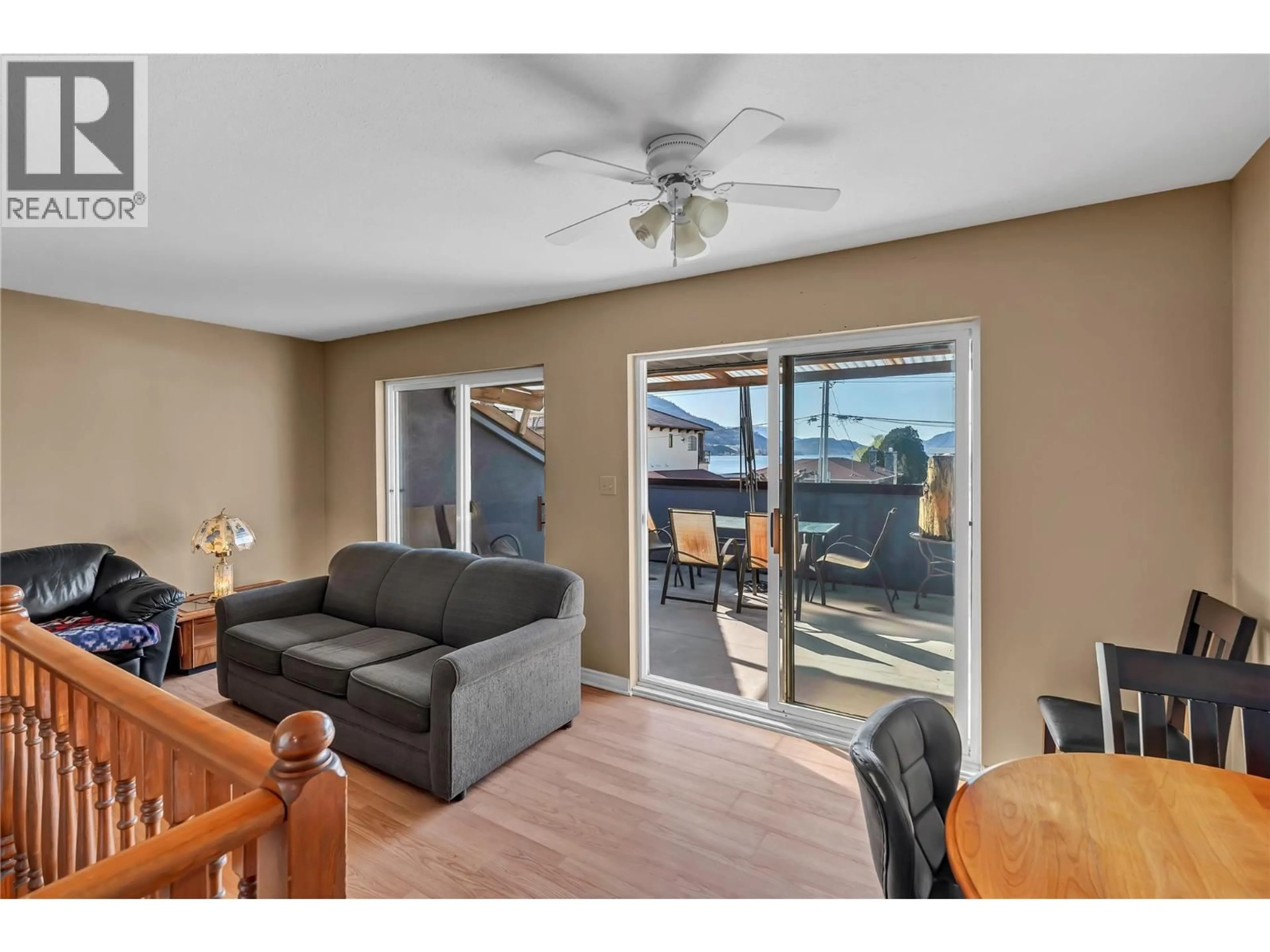 Living room with furniture, wood/laminate floor for 331 SUDBURY AVENUE, Penticton British Columbia V2A8M7