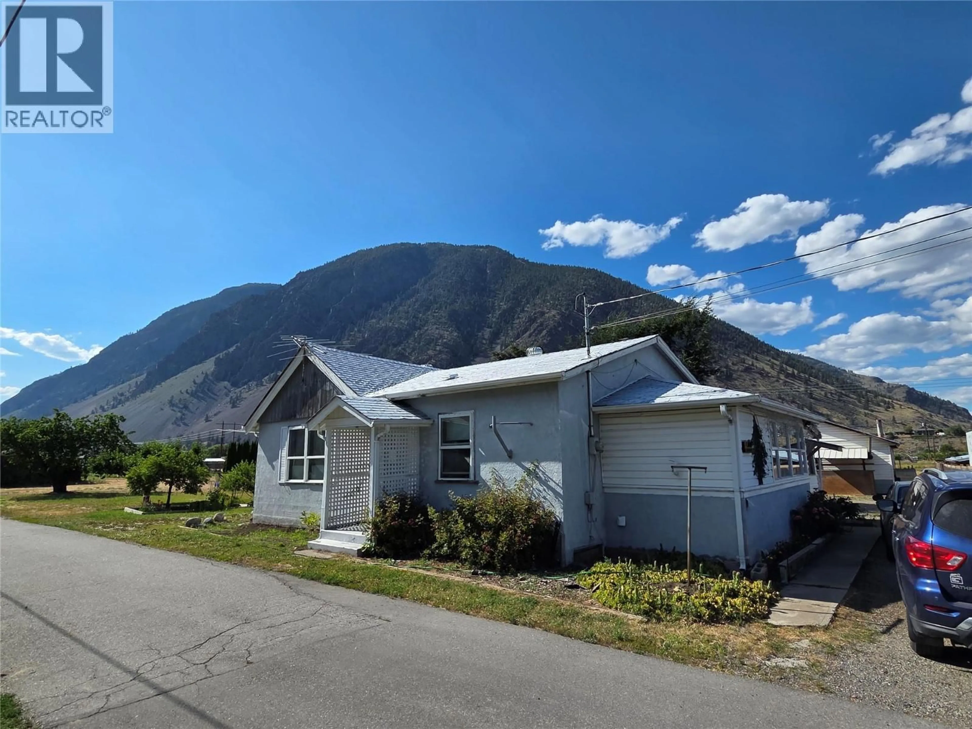 Home with vinyl exterior material, mountain view for 110 9TH AVENUE, Keremeos British Columbia V0X1N3