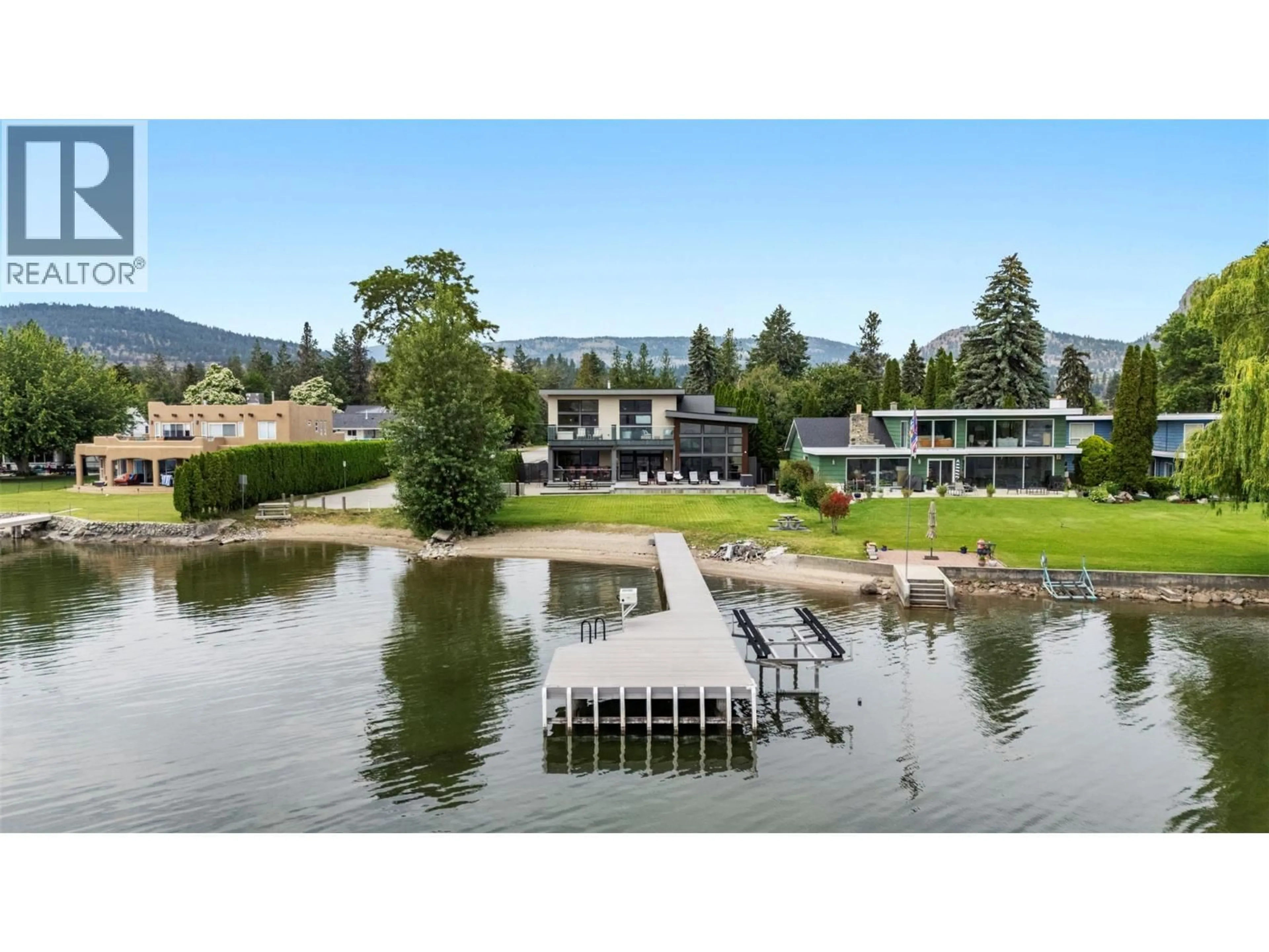 A pic from outside/outdoor area/front of a property/back of a property/a pic from drone, water/lake/river/ocean view for 704 STONOR STREET, Summerland British Columbia V0H1Z9