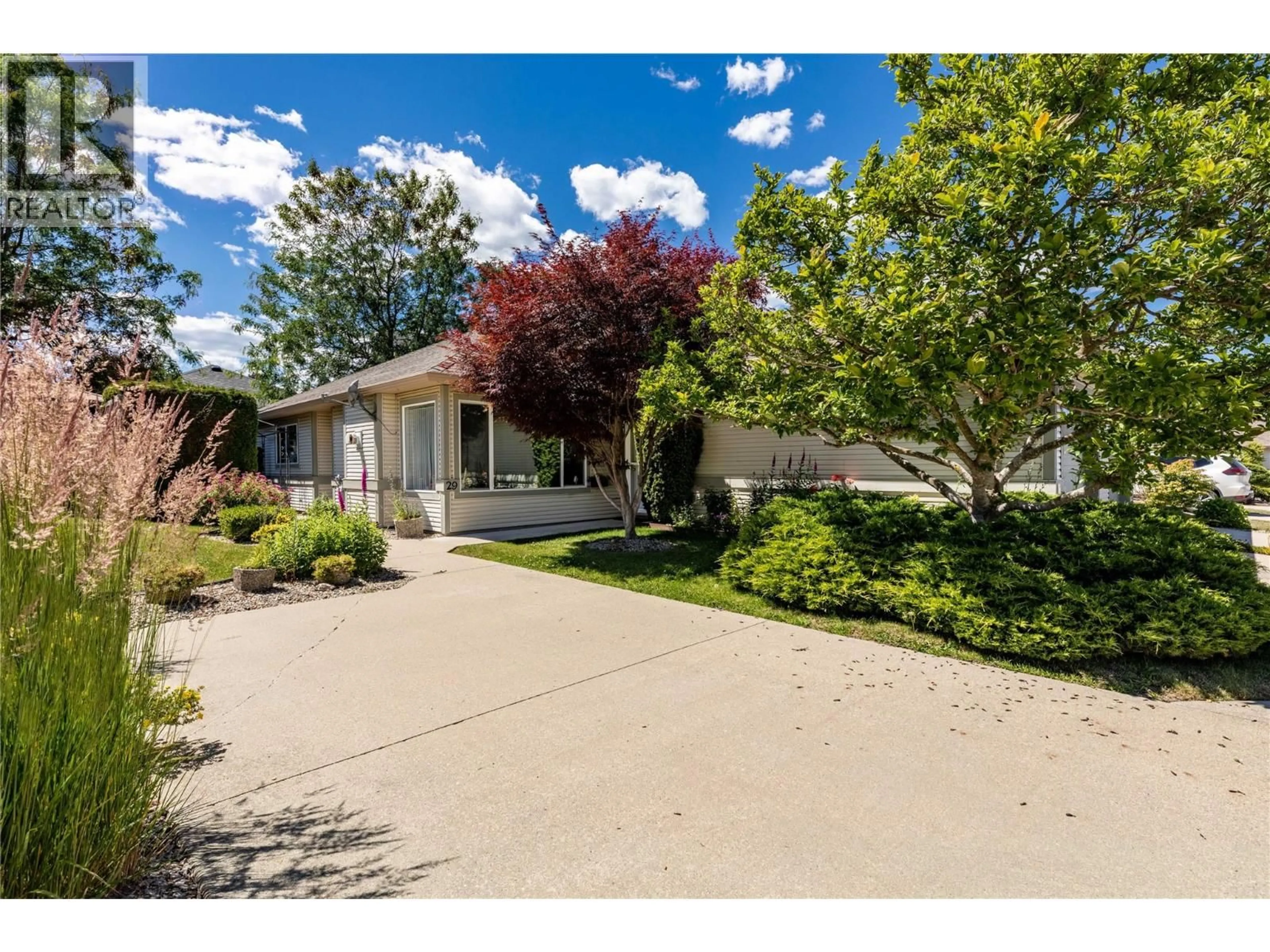 A pic from outside/outdoor area/front of a property/back of a property/a pic from drone, street for 29 - 111 HARBOURFRONT DRIVE NORTHWEST, Salmon Arm British Columbia V1E1A3