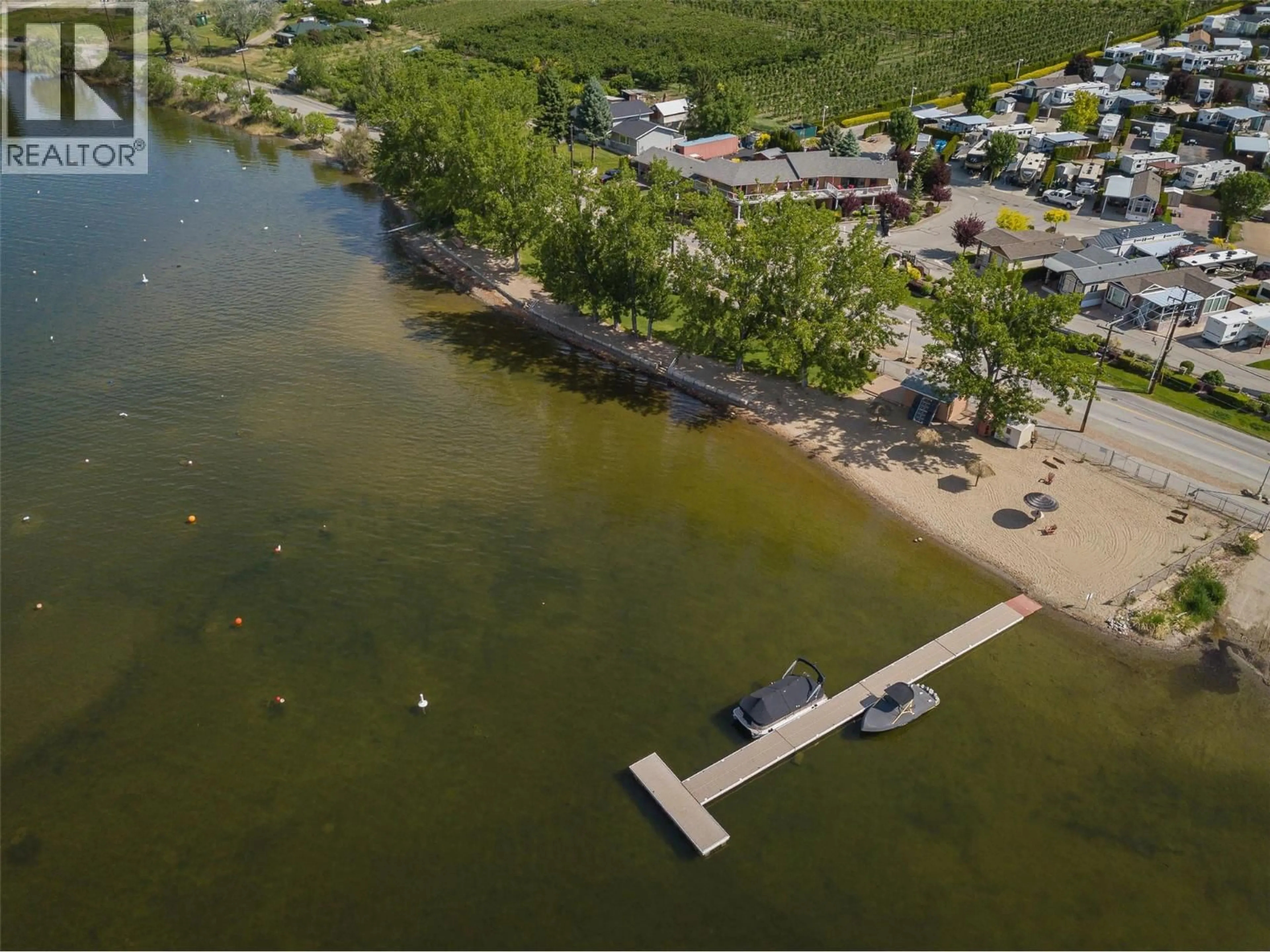 A pic from outside/outdoor area/front of a property/back of a property/a pic from drone, water/lake/river/ocean view for 111 - 5005 LAKESHORE DRIVE, Osoyoos British Columbia V0H1V6