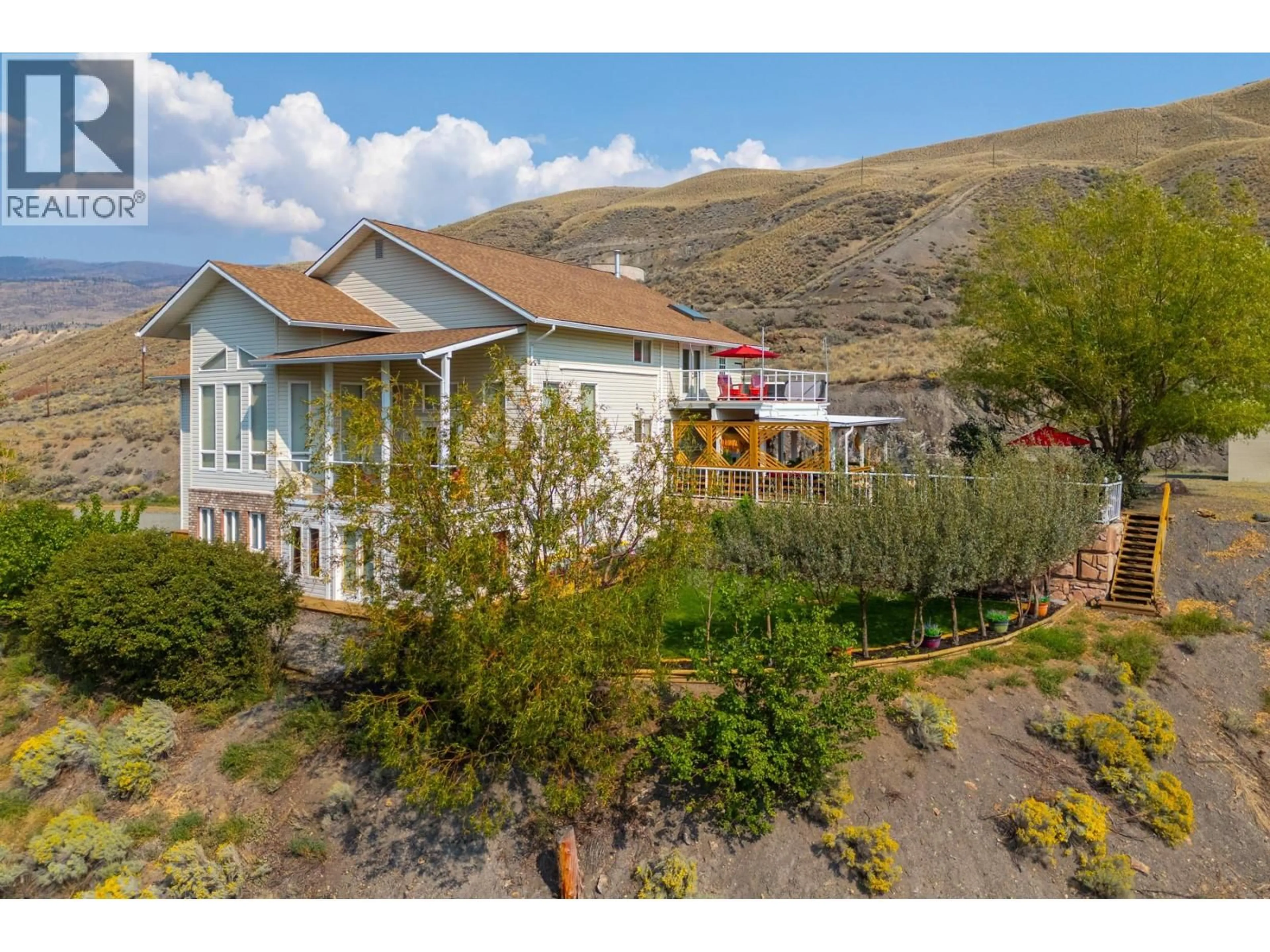 A pic from outside/outdoor area/front of a property/back of a property/a pic from drone, mountain view for 988 COLLINS ROAD, Cache Creek British Columbia V0K1H0